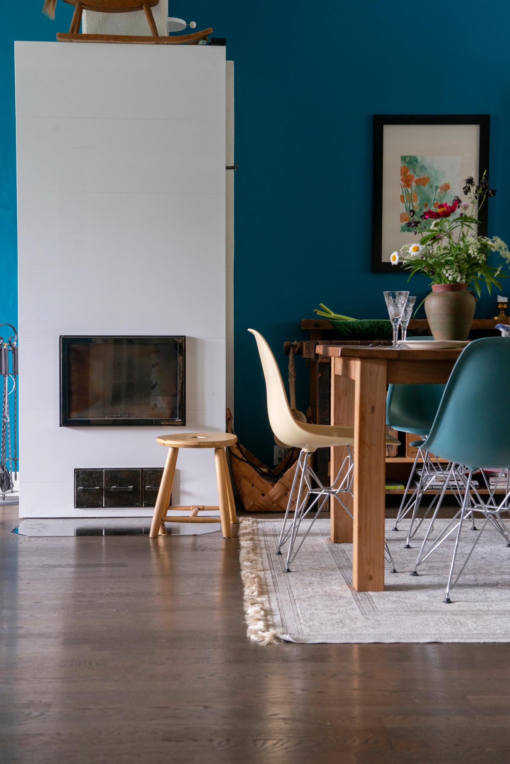 white fireplace and dining table