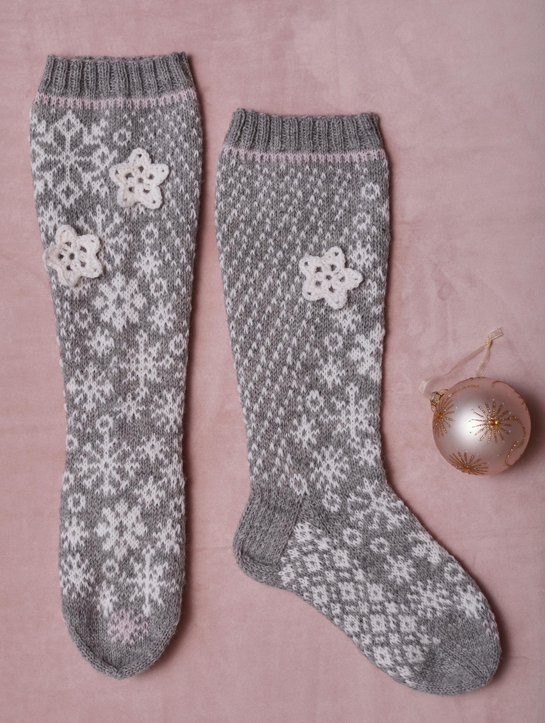 Snowflake socks on a surface