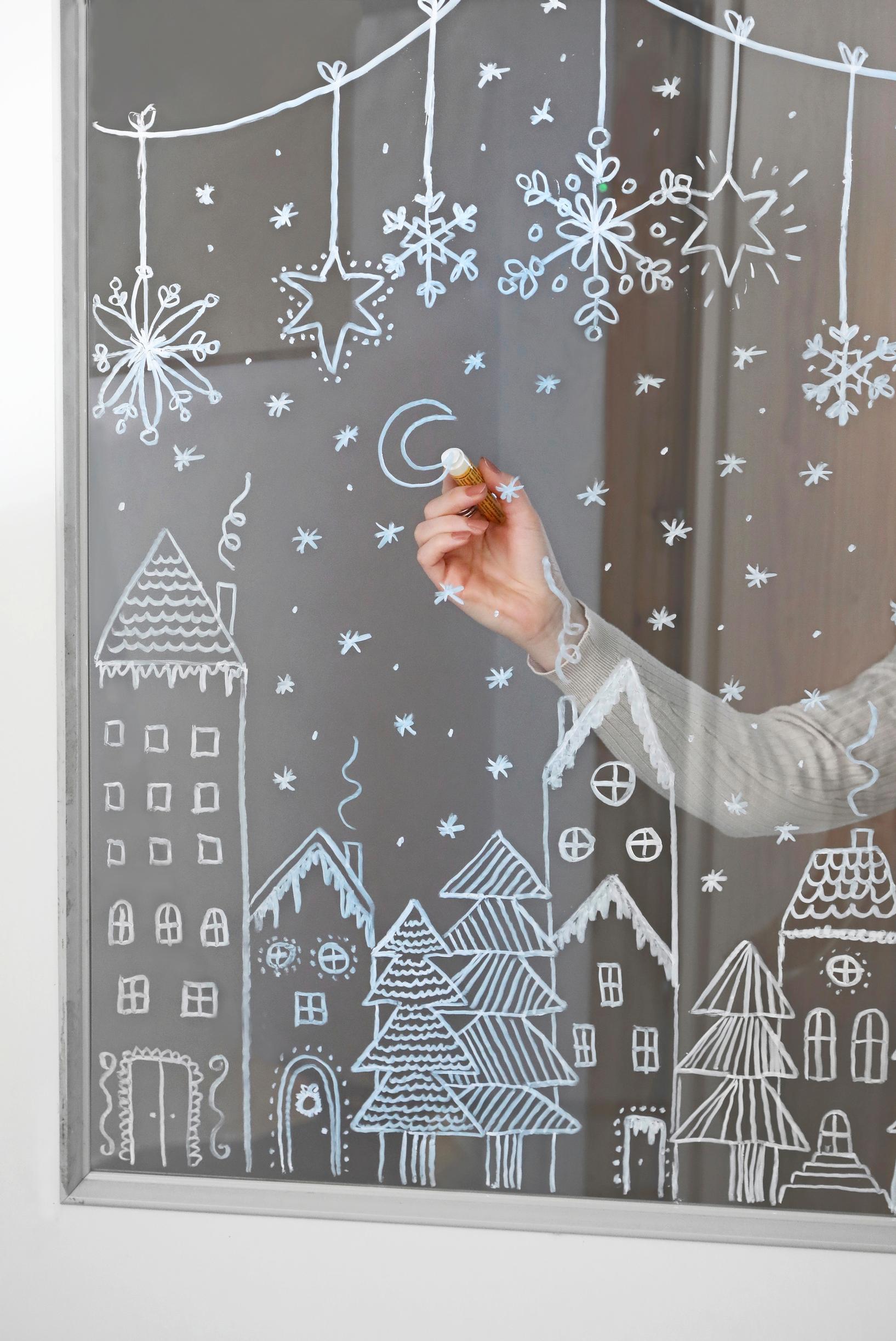 A drawing done with a chalk marker on a window