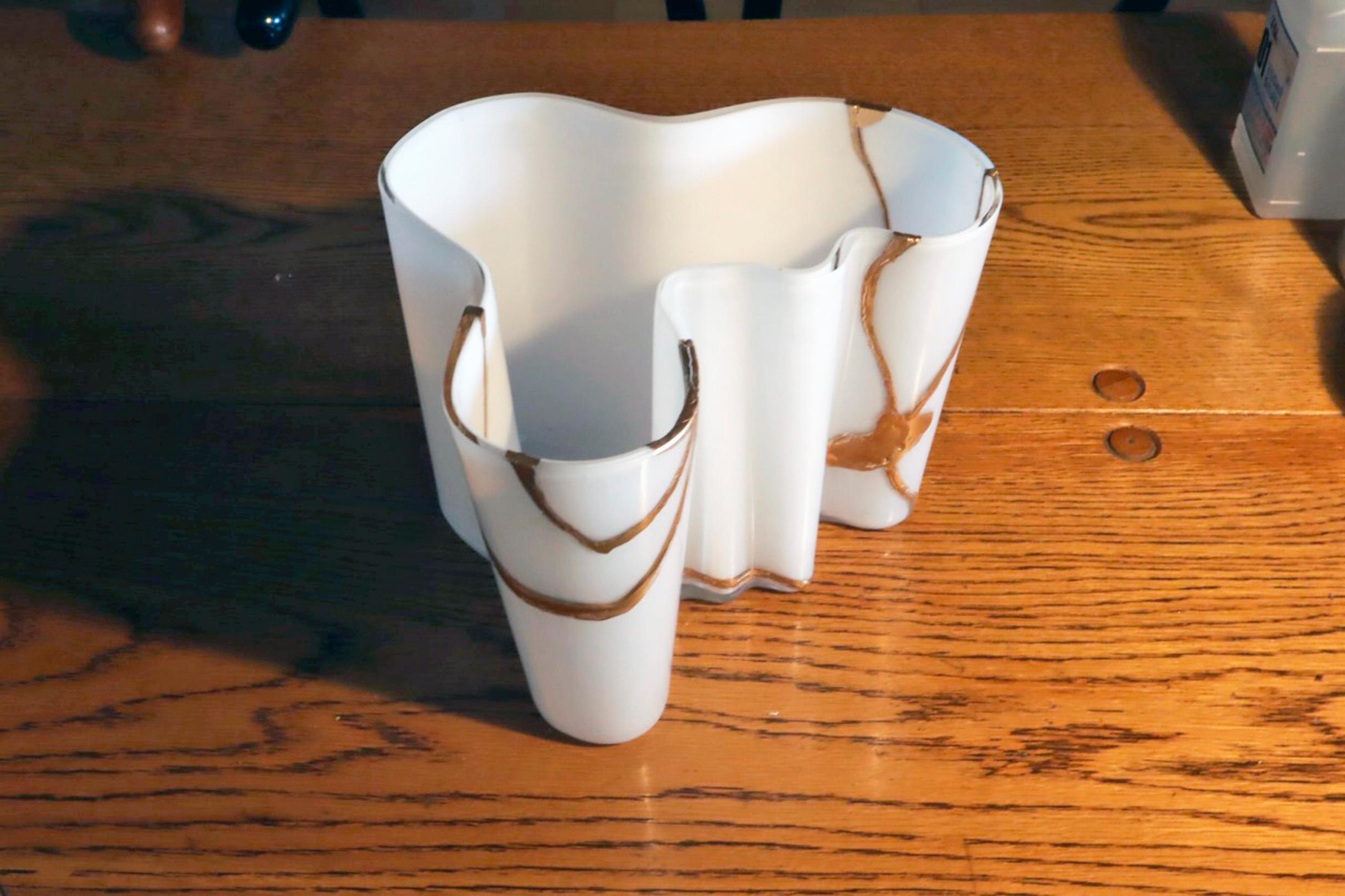 Broken vase fixed with gold
