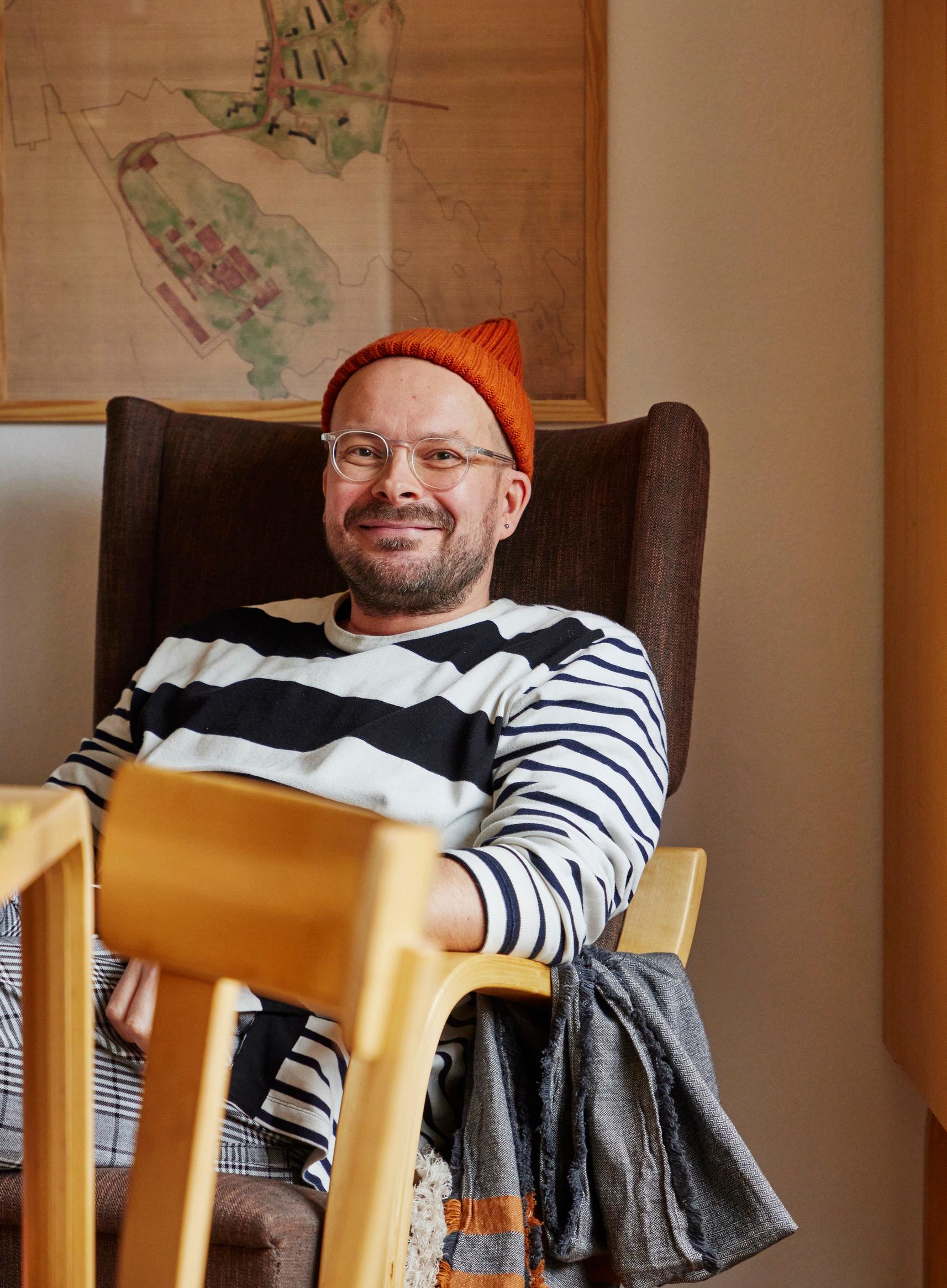 Jani Kylmänen sitting in a chair