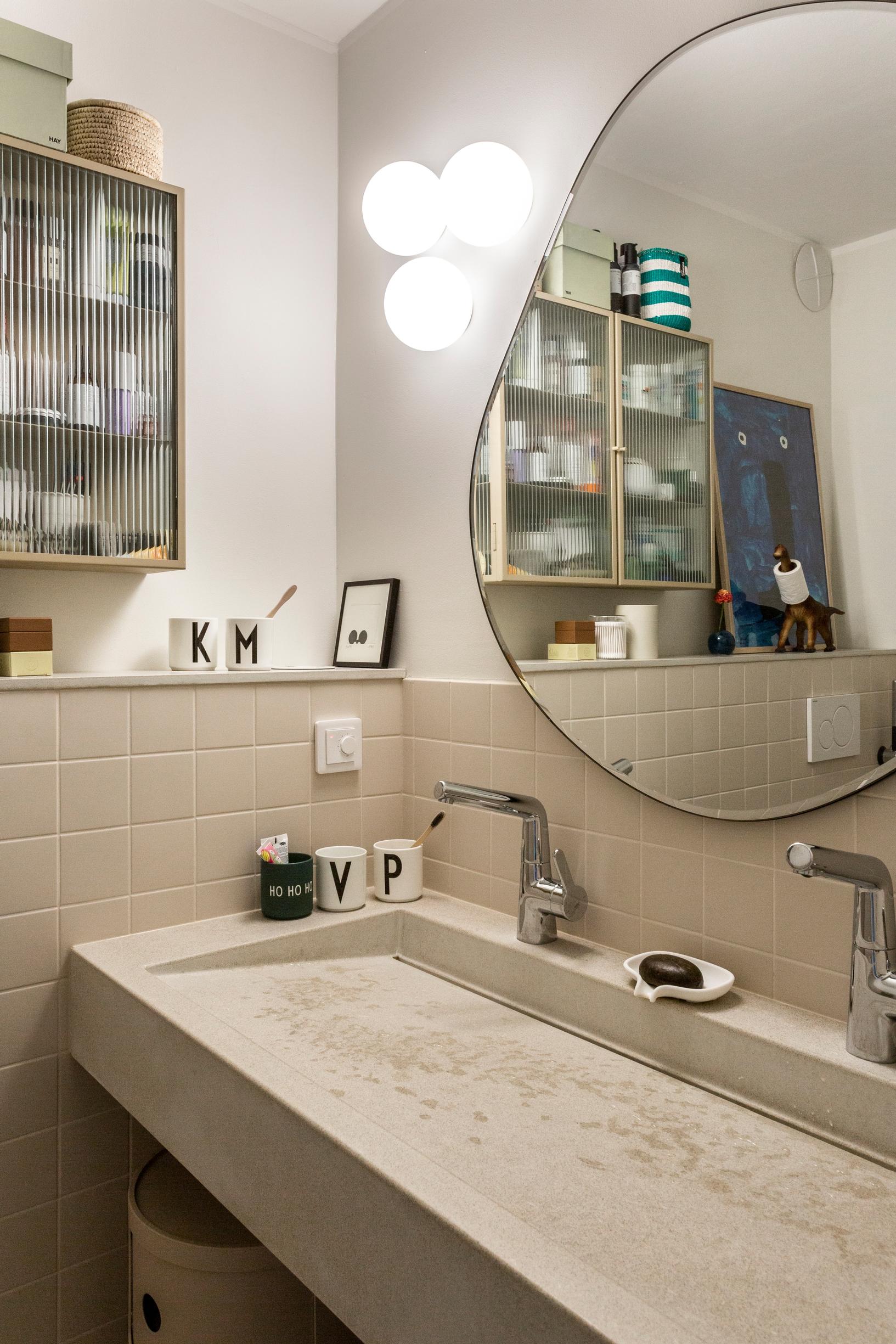 Bathroom with a concrete sink