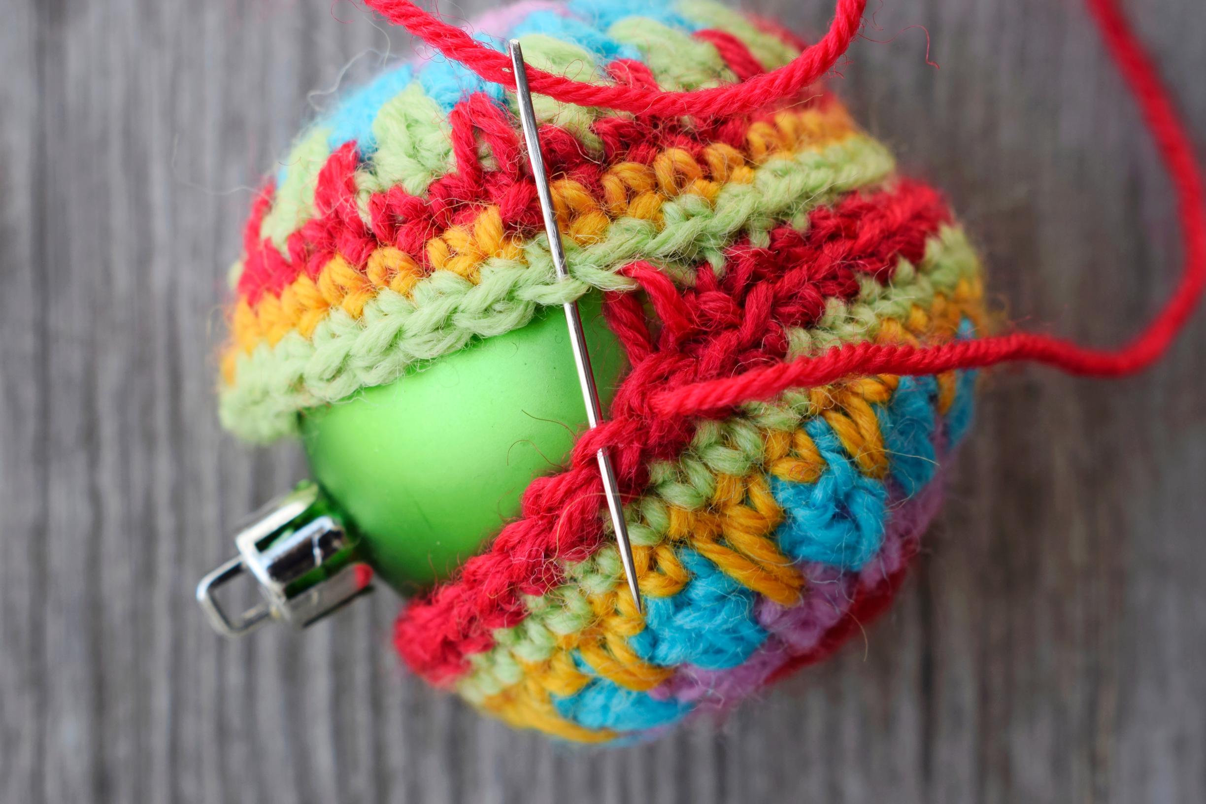 Sew the crocheted halves together.