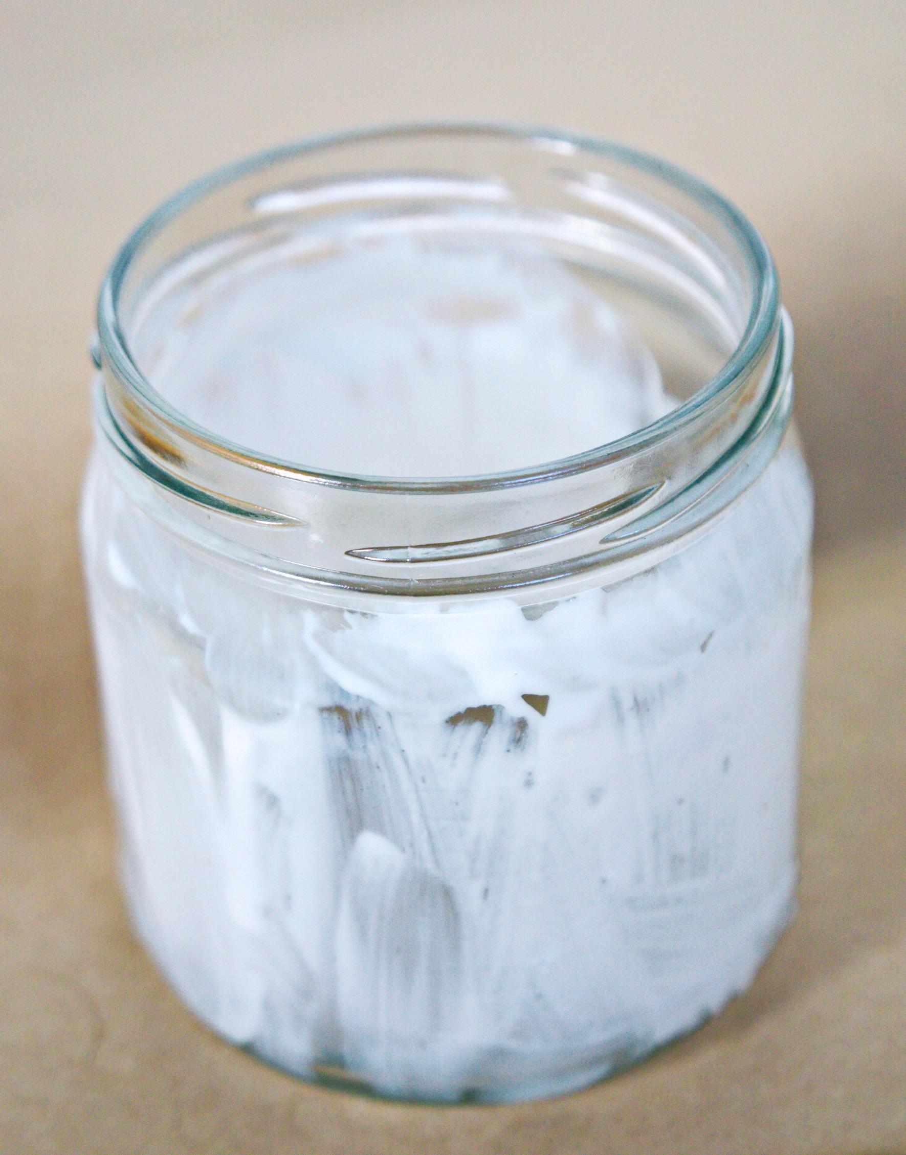 Applying glue to the jar for the salt lantern