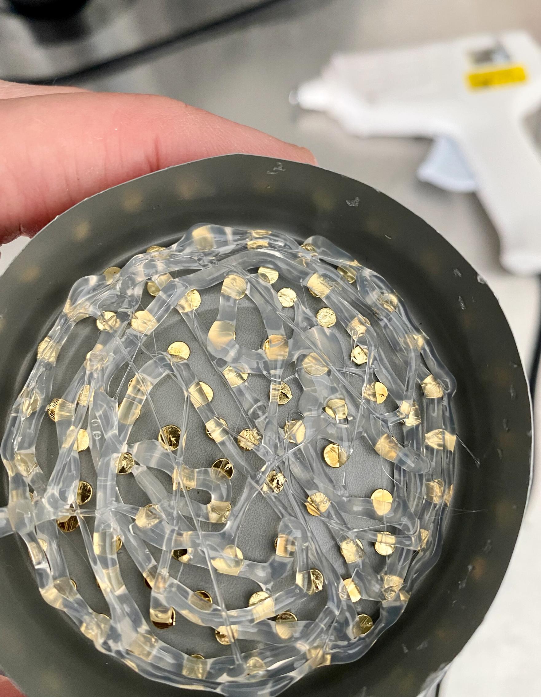 Covering the nail heads with glue