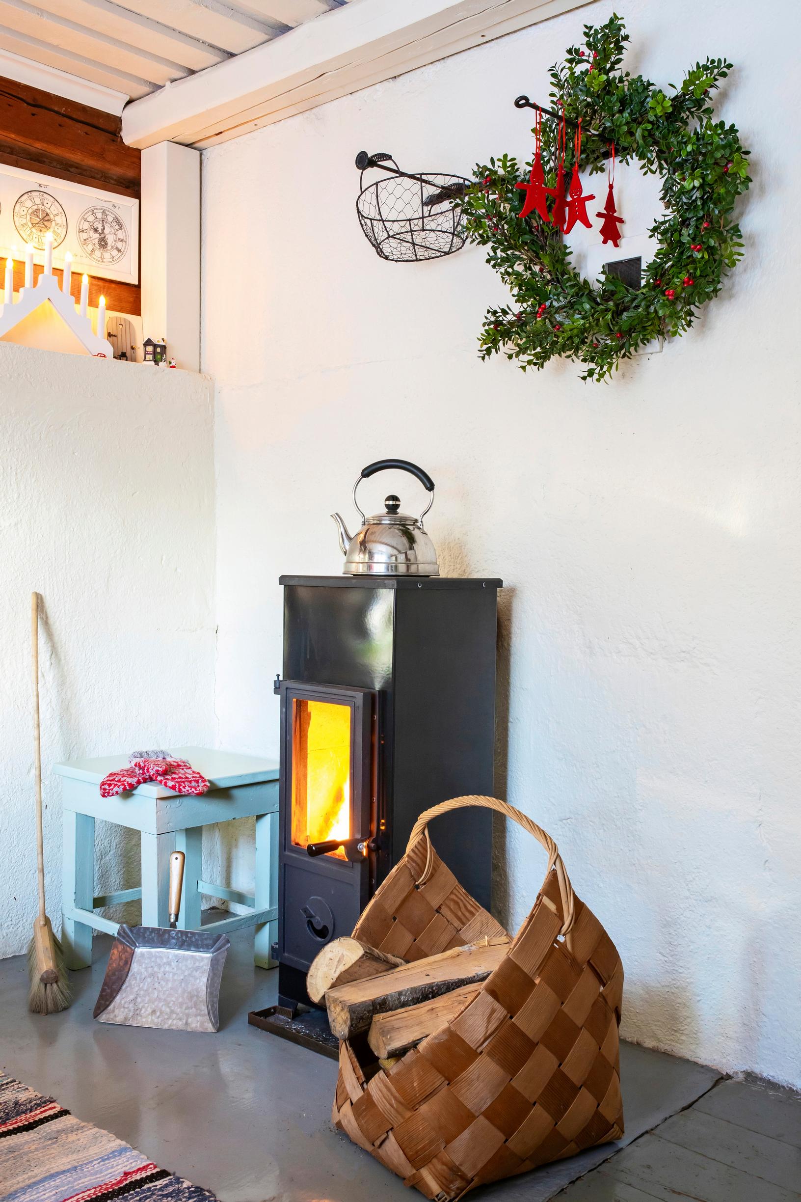 The cottage’s woodstove warms and dries the mittens