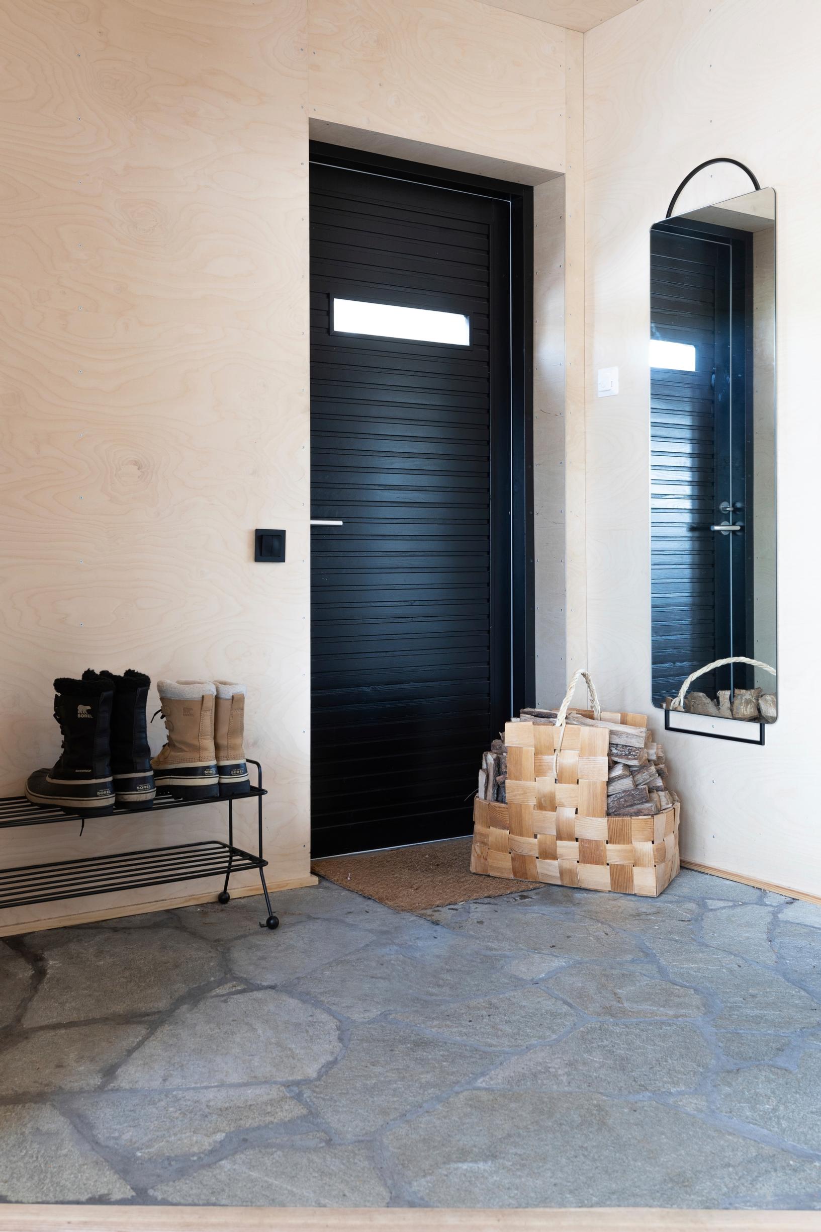The entrance floor is covered with slate