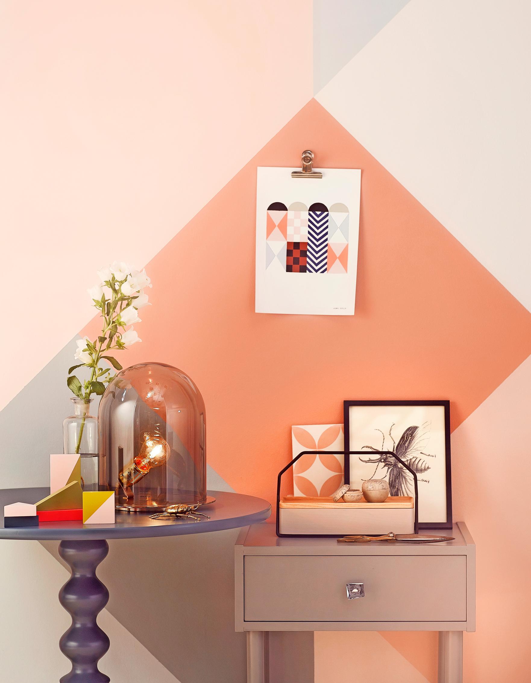The bold checkerboard pattern makes the small furniture arrangement in the entryway unquestionably intriguing.