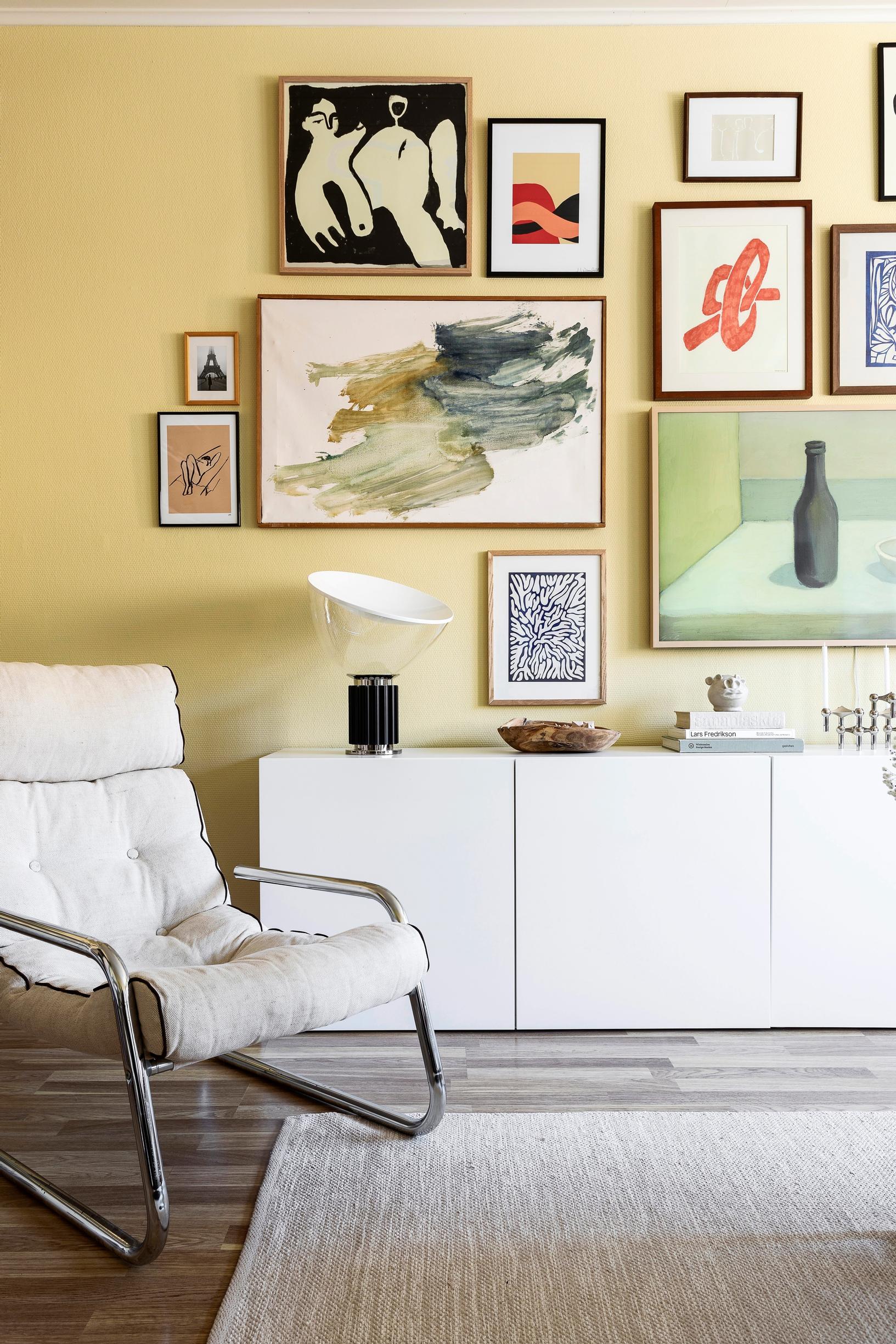 An art collage on the living room wall