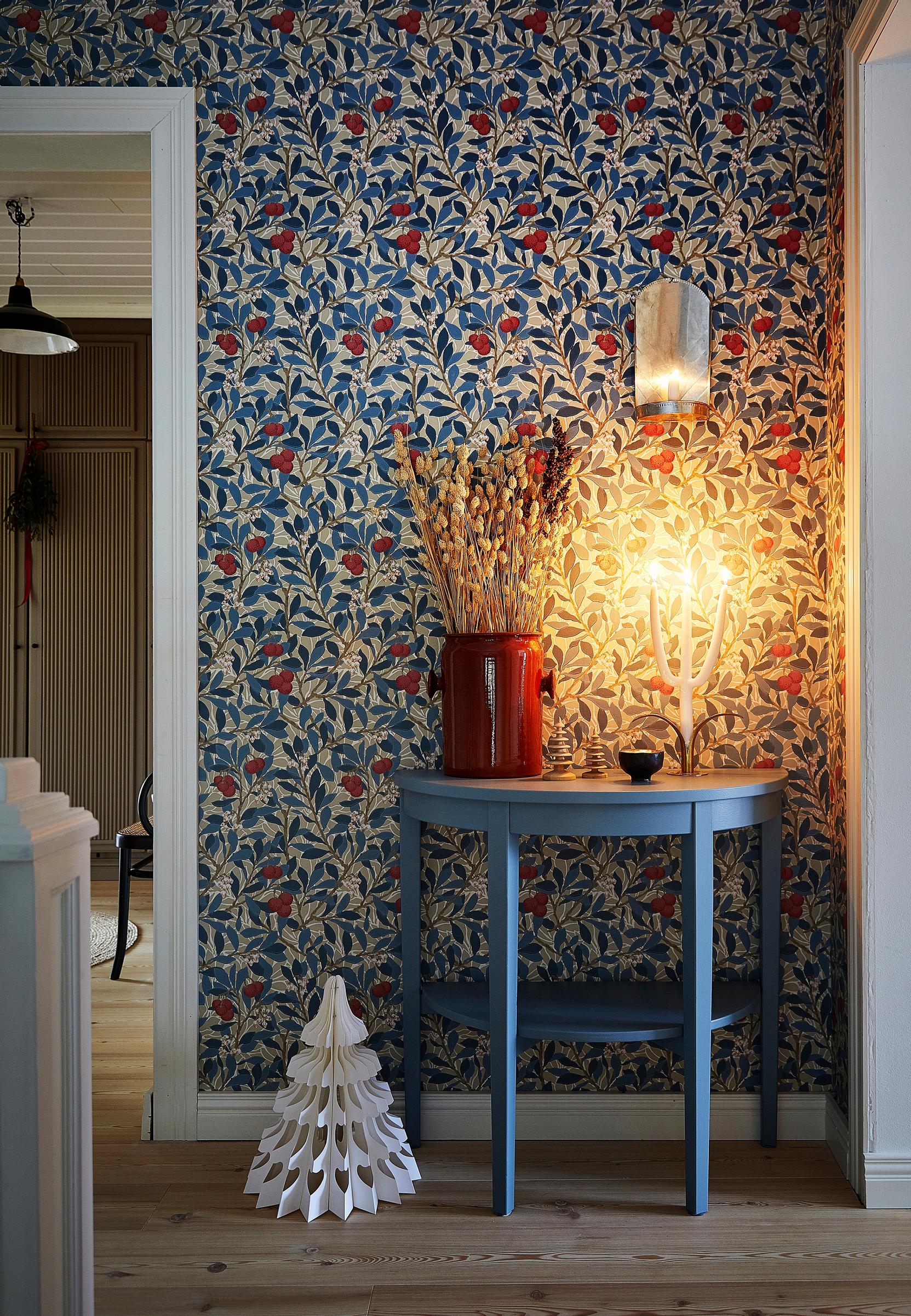 William Morris’s Arbutus wallpaper in the entry hall