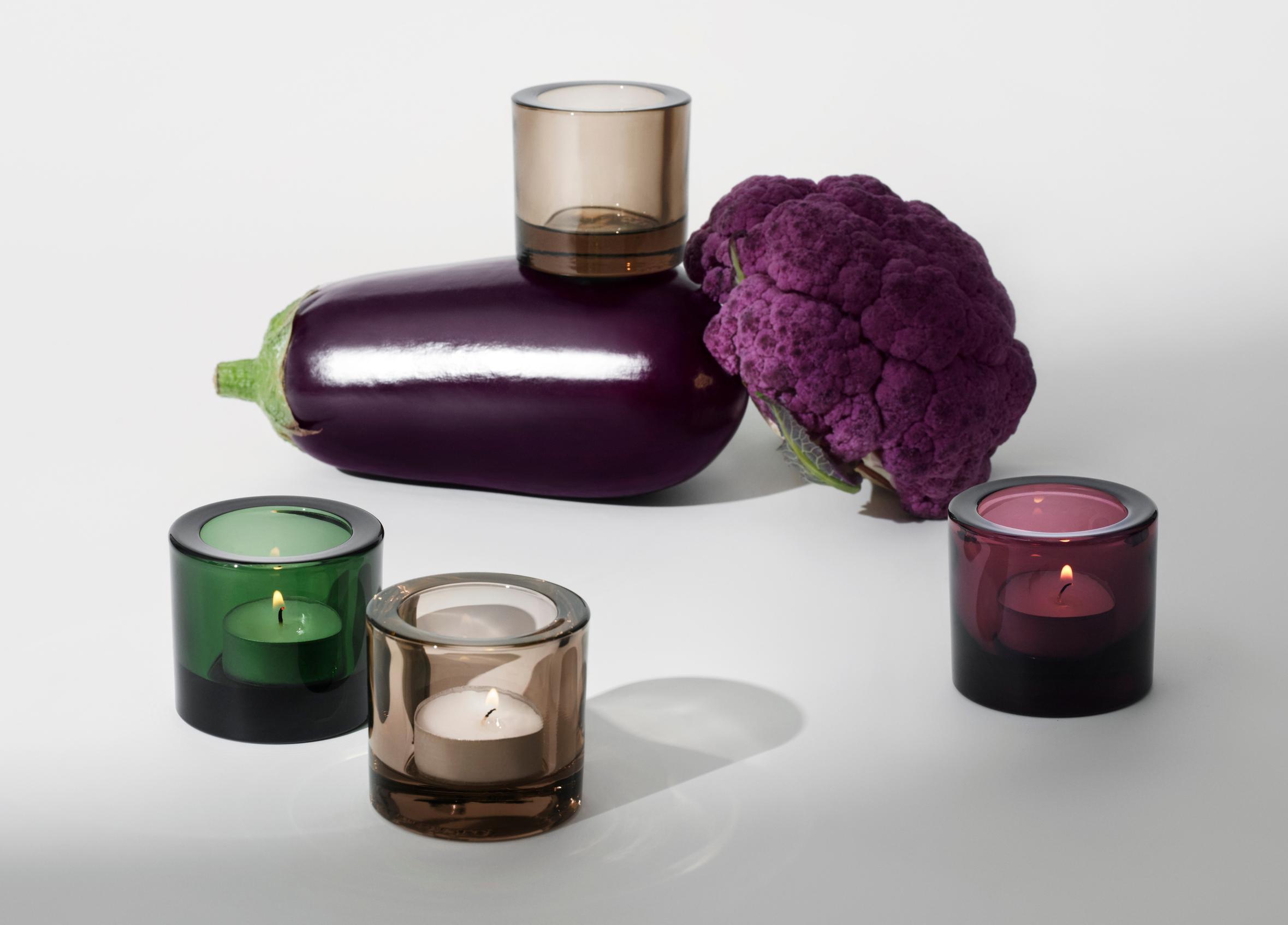 Kivi tealight colors: pine green, linen, and calluna.