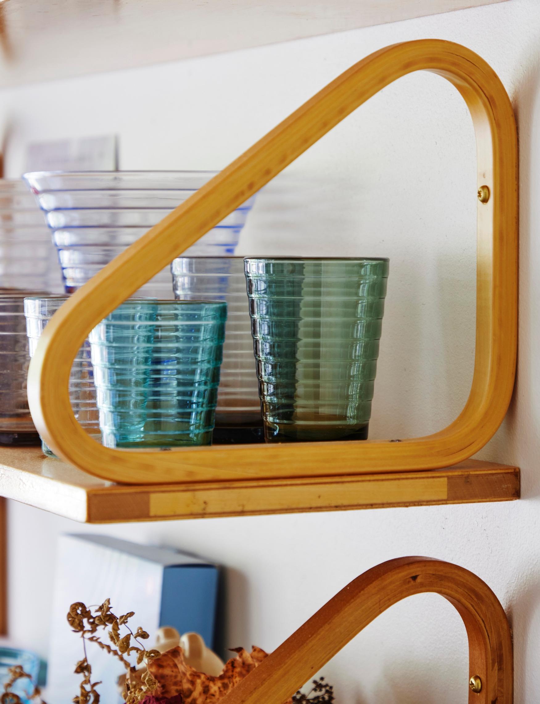 A collection of Aino Aalto’s glasses on an Artek shelf.