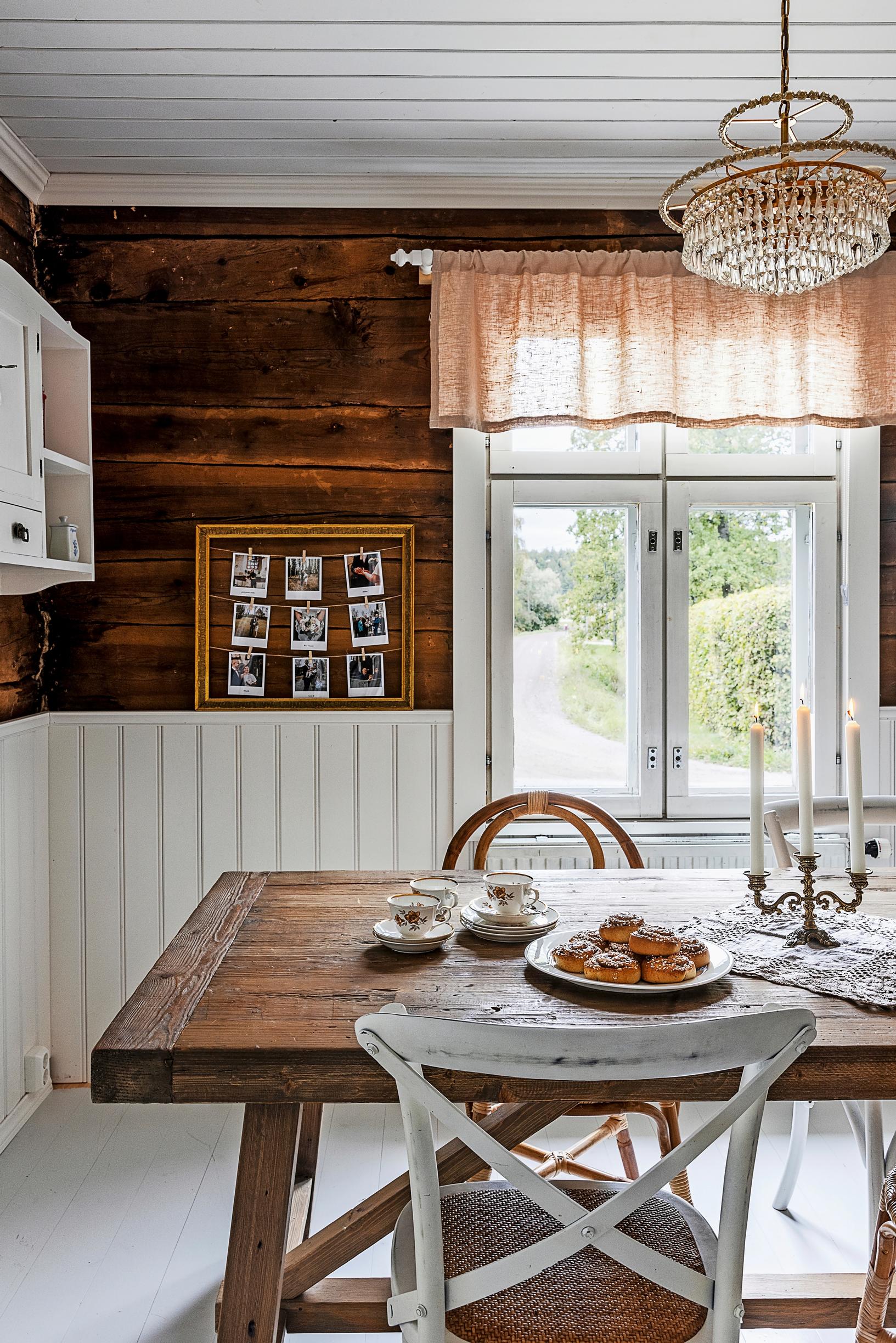 In the foreground, there’s a wooden dining table surrounded by various small chairs.