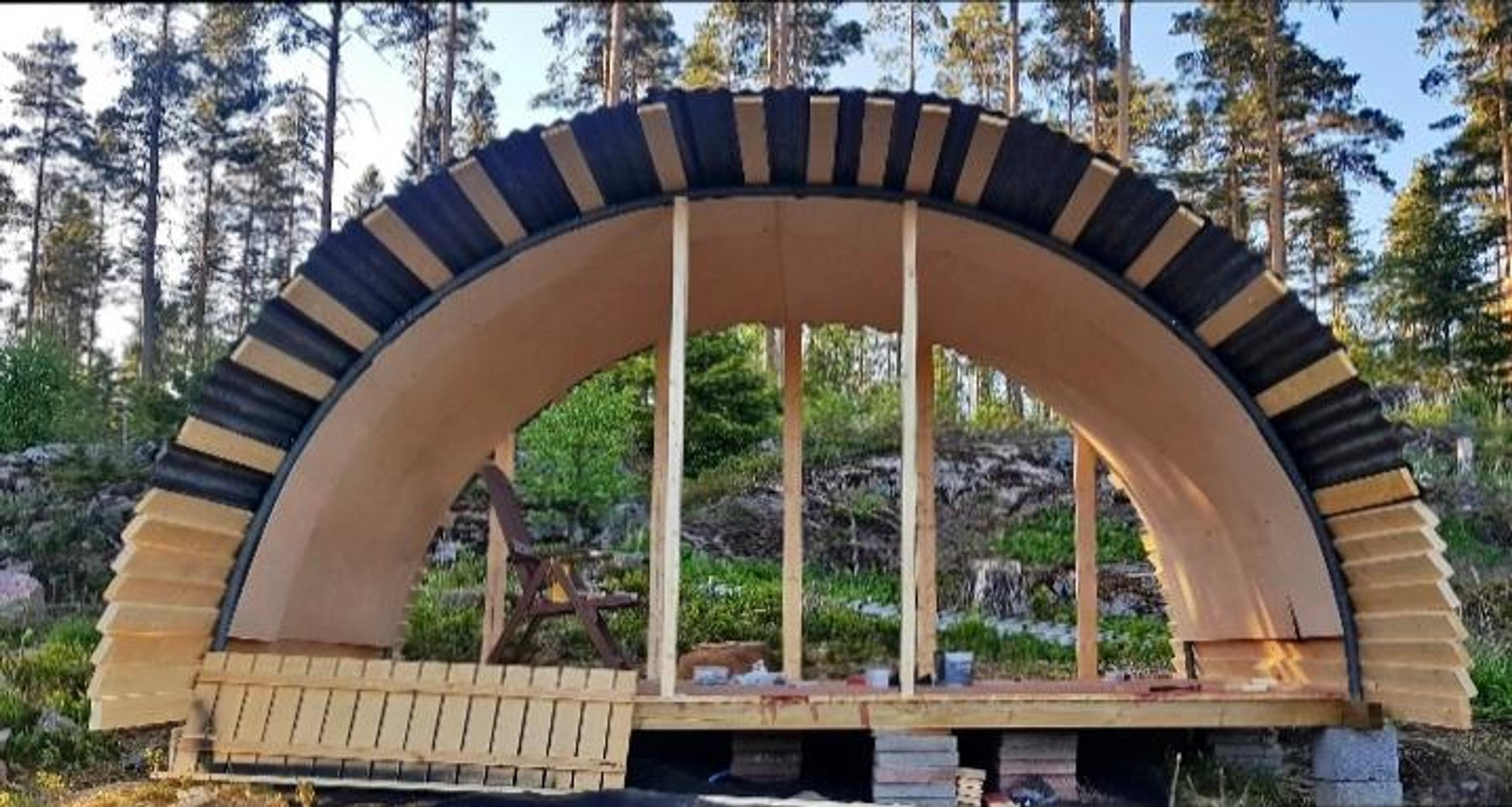 The backyard sauna made from an old trampoline during construction.