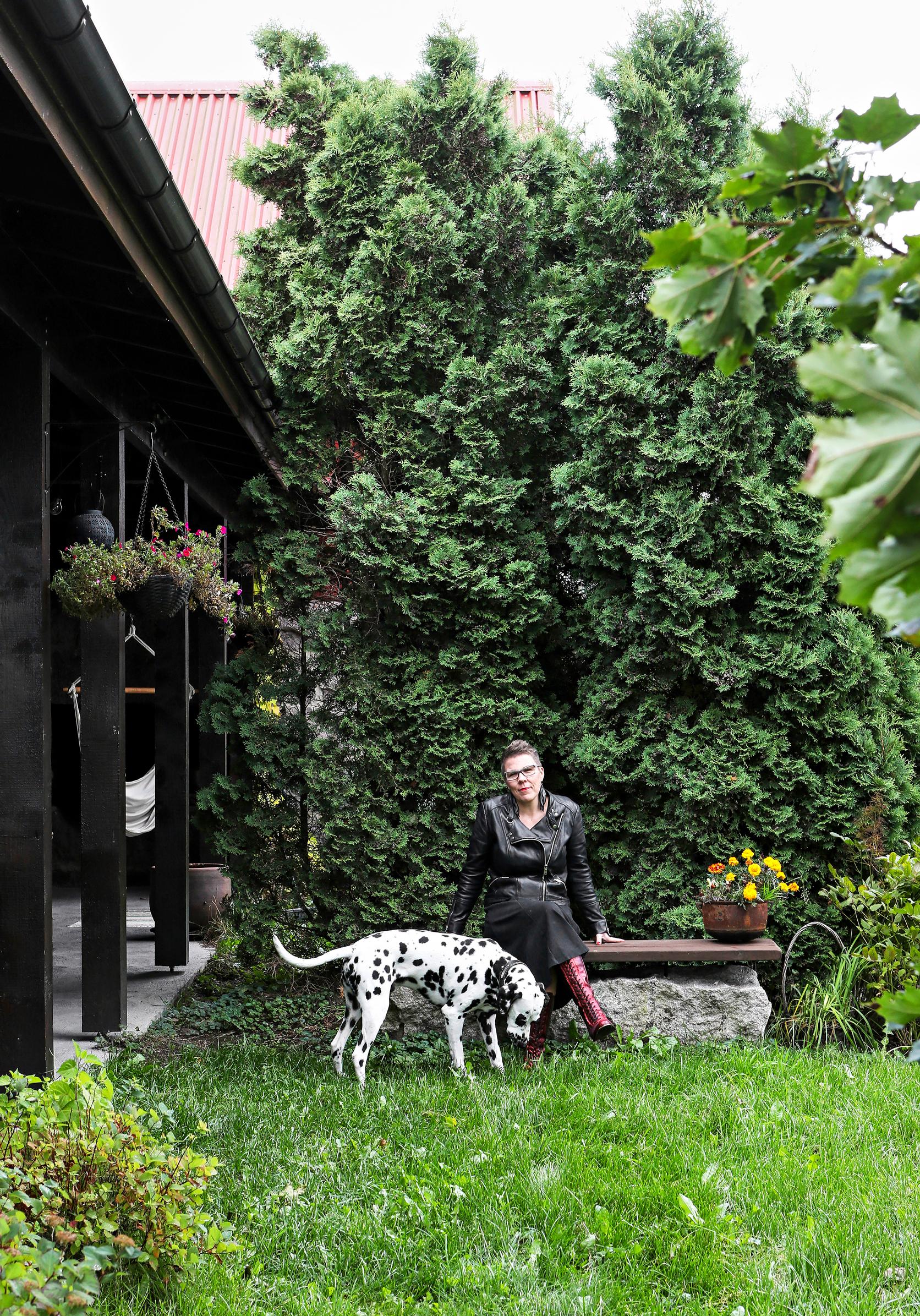 Maria Lassila-Merisalo in the garden