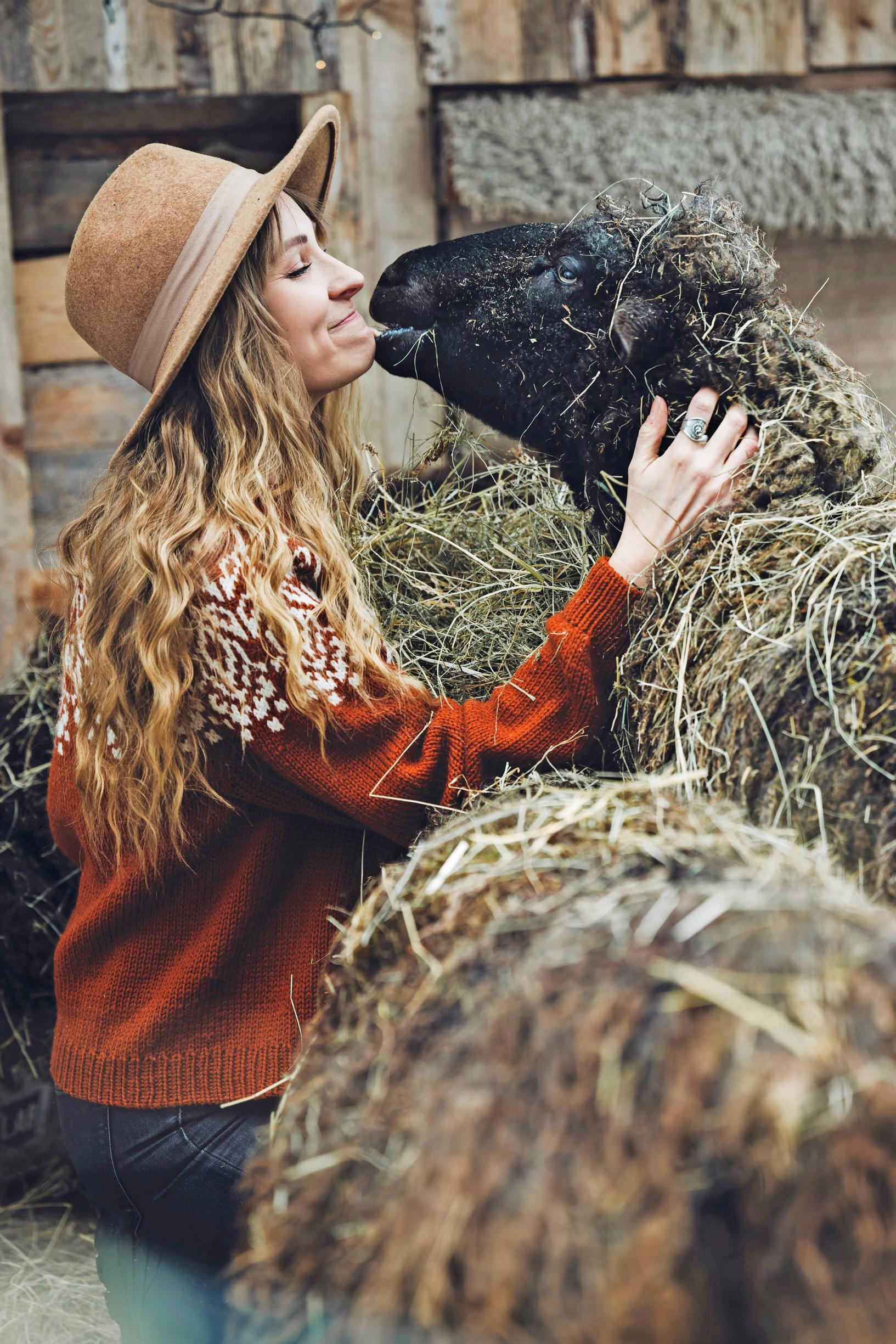 Ronja Hakalehto with her sheep.
