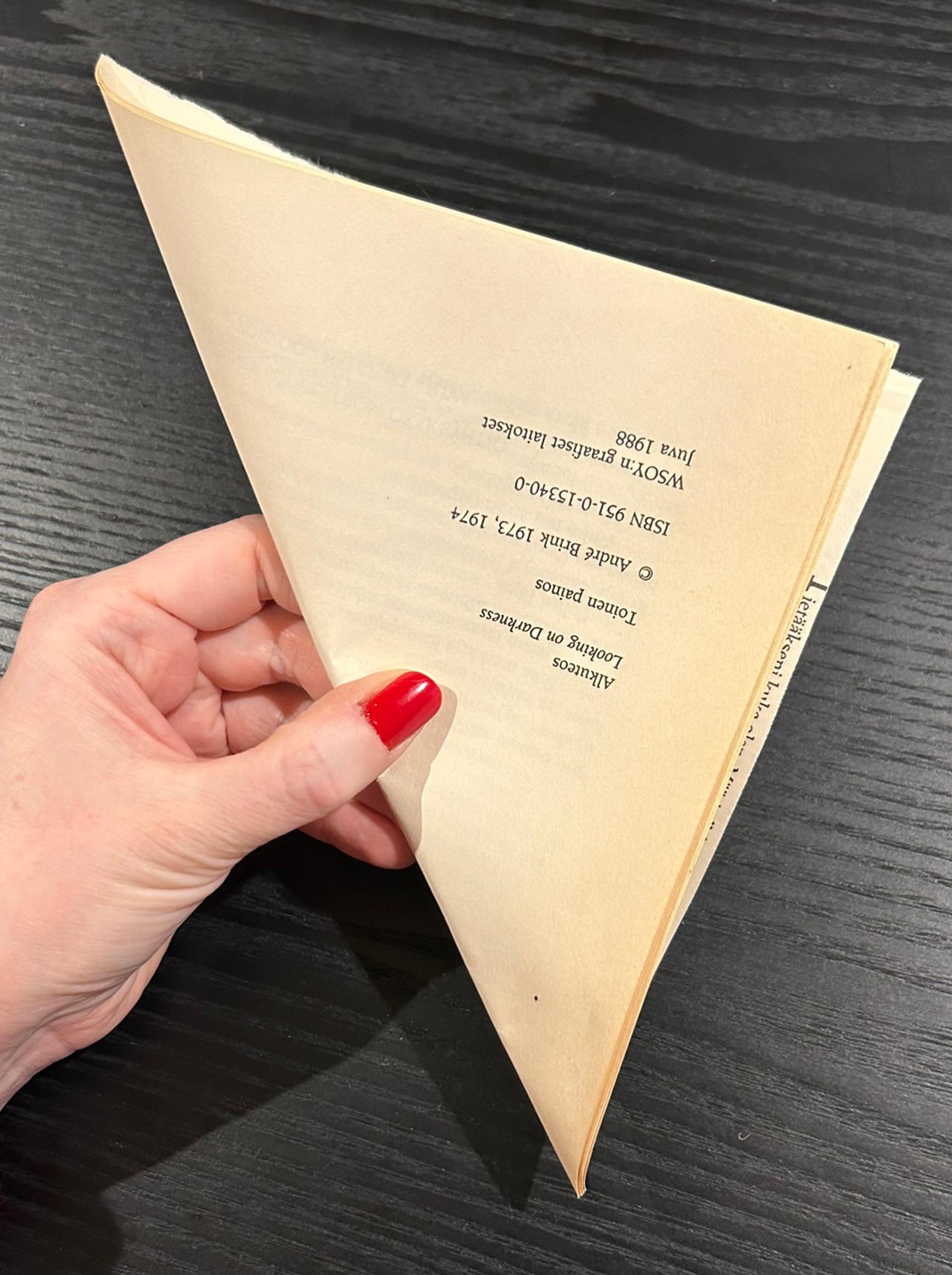 Cutting the book pages for the paper dahlia