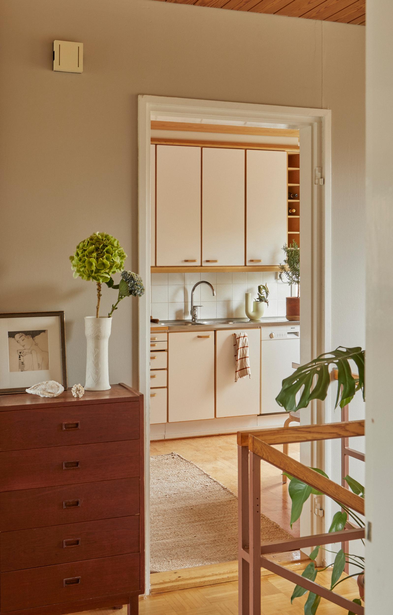 A view from the upstairs landing into the kitchen.