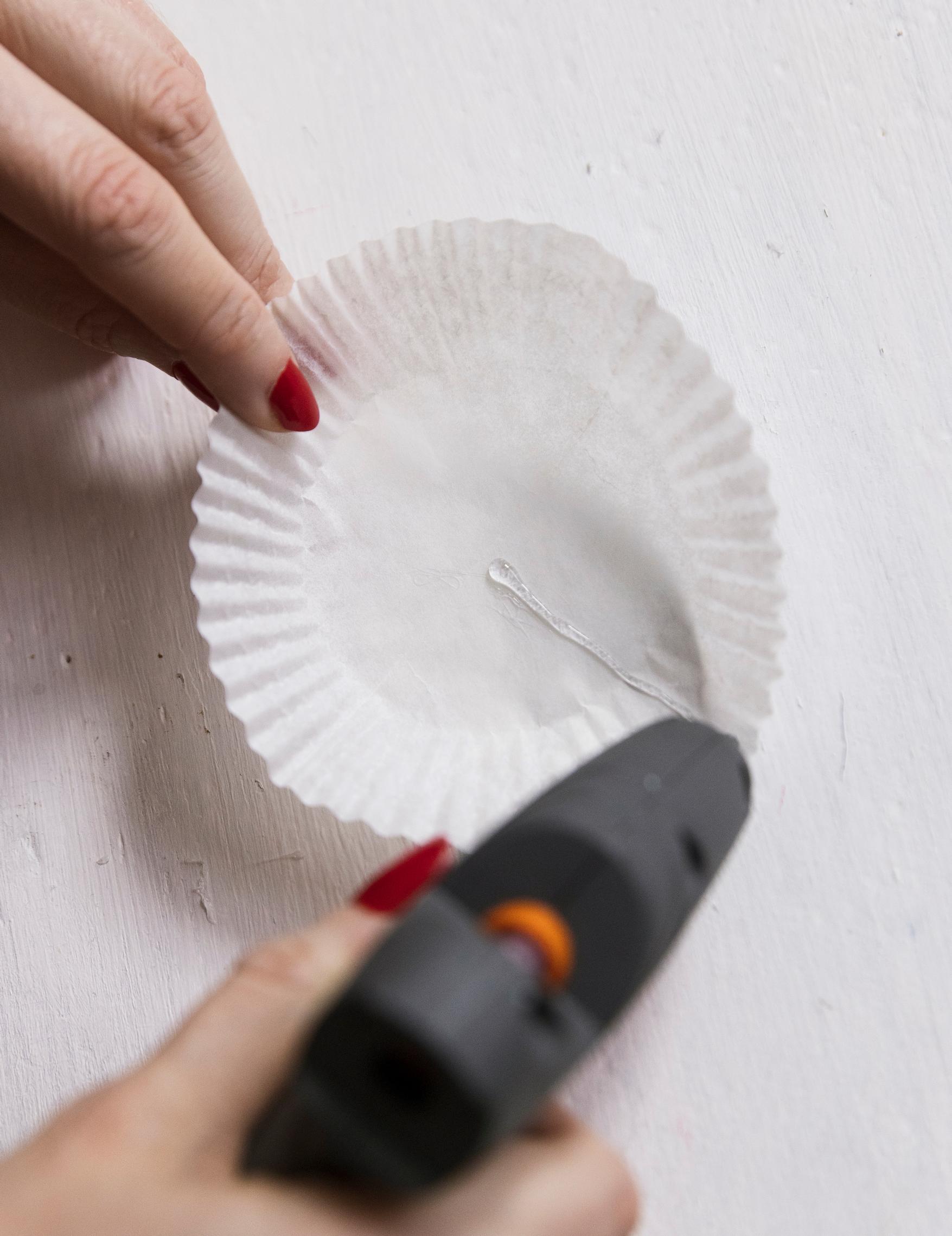 Gluing the cupcake liners