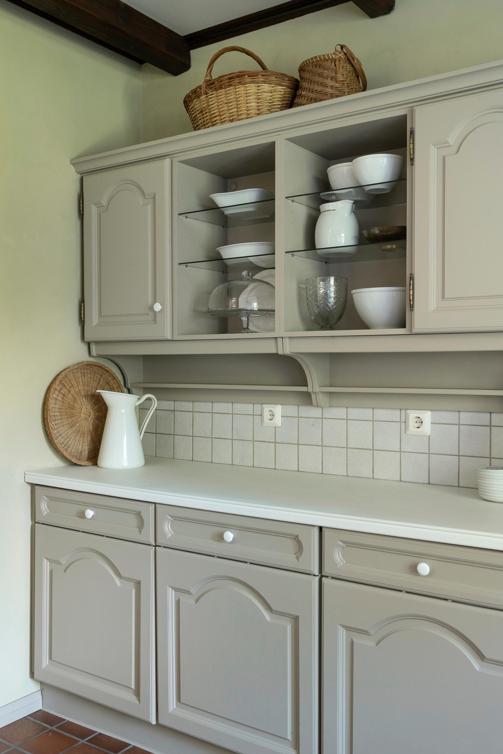 Photo of the kitchen cabinetry after painting.