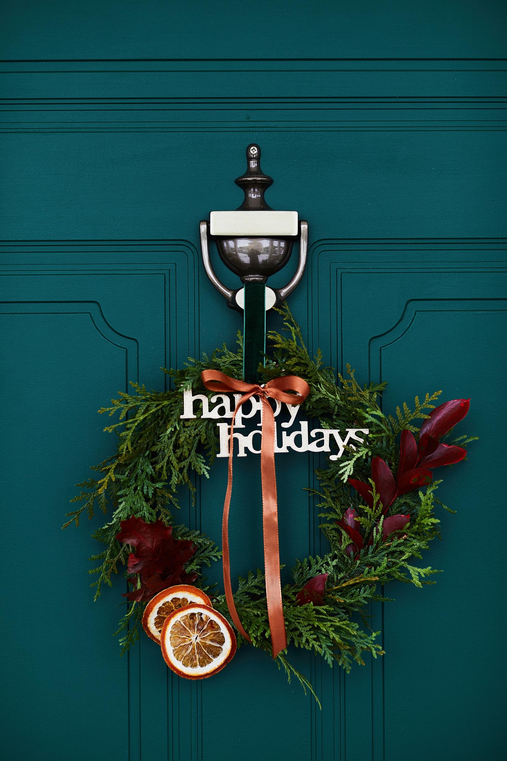 A thuja wreath on the front door.