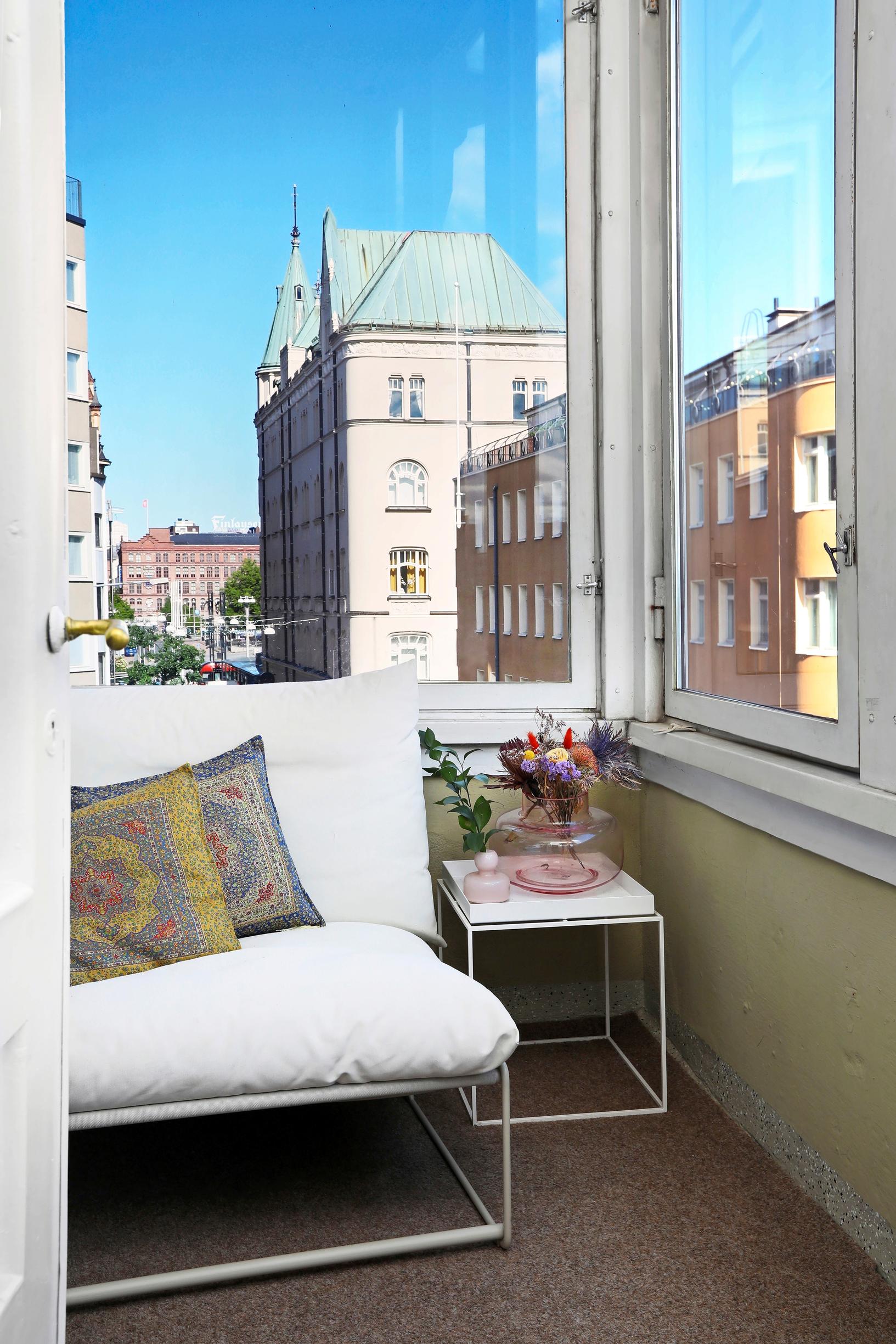 A balcony with city views