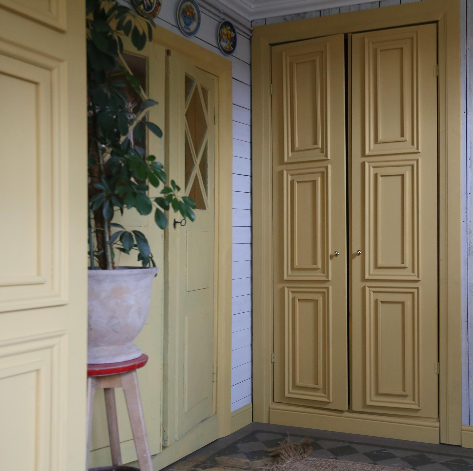 Yellow paneled doors