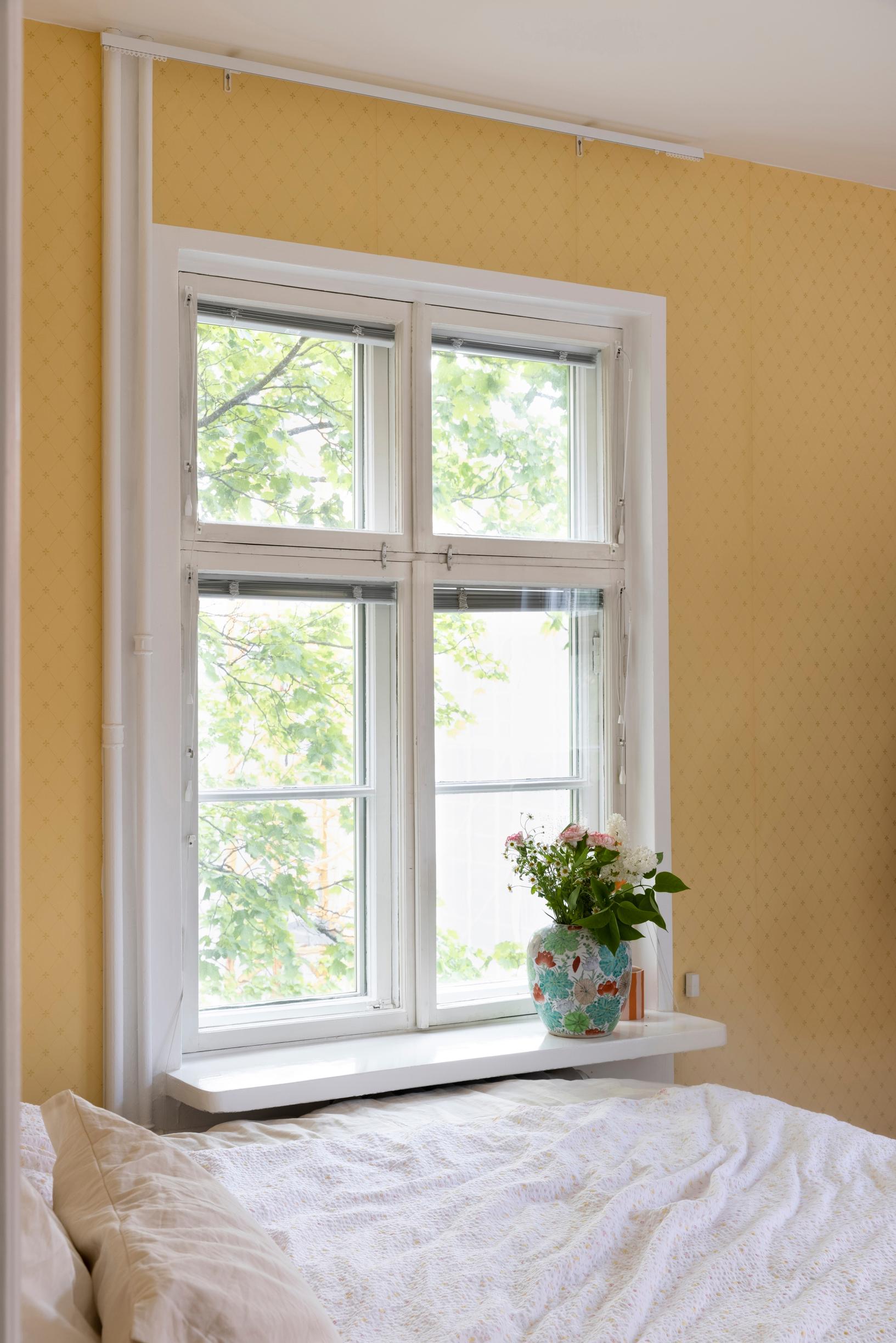 A wide windowsill in the bedroom