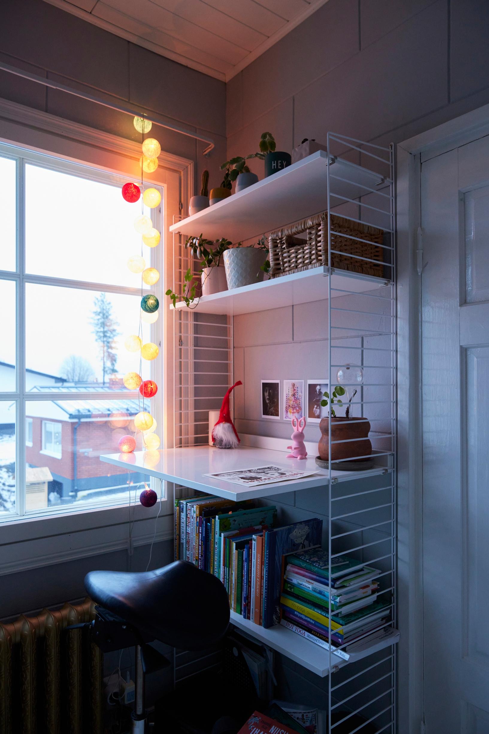 String work station in front of the window