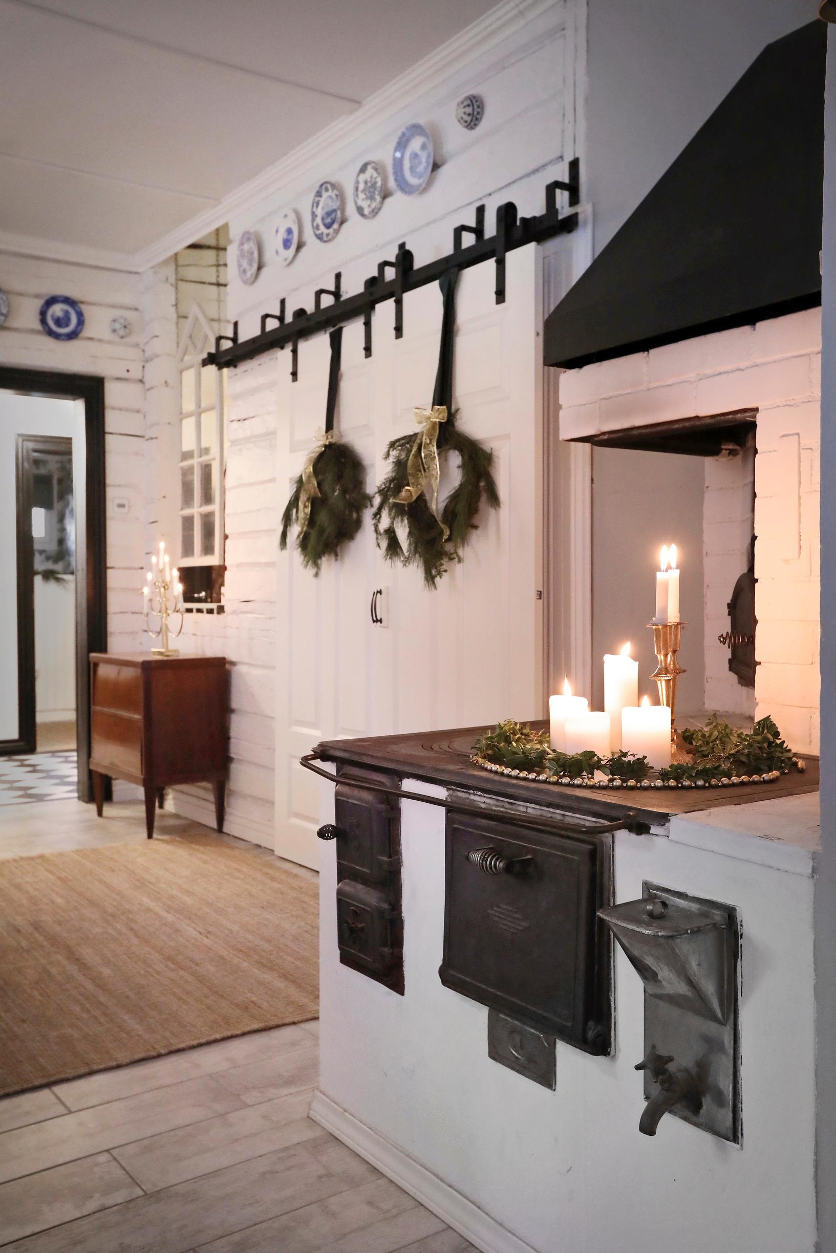 The original wood-burning stove in the renovated kitchen of the old riding estate