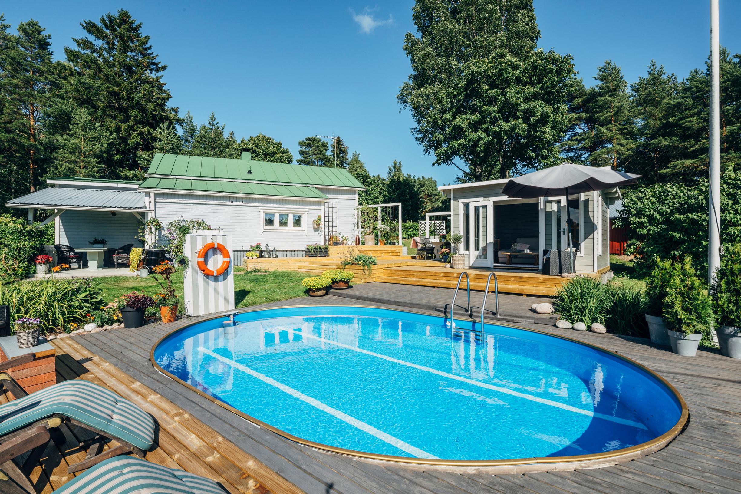 Anne-Maria built a pool house and deck for under five thousand euros—“I can't even remember what the yard used to look like!”