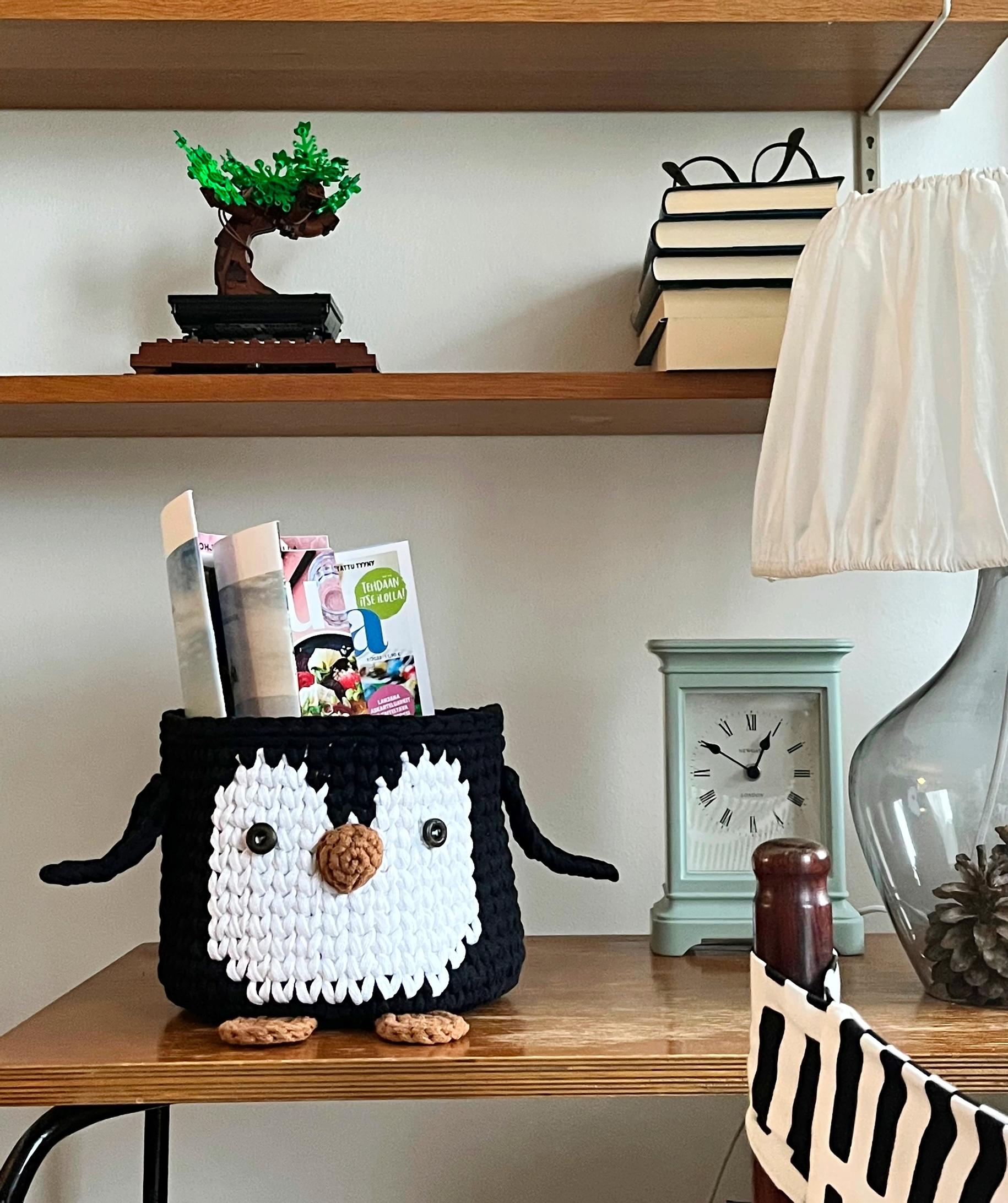 A finished penguin basket as part of the decor.