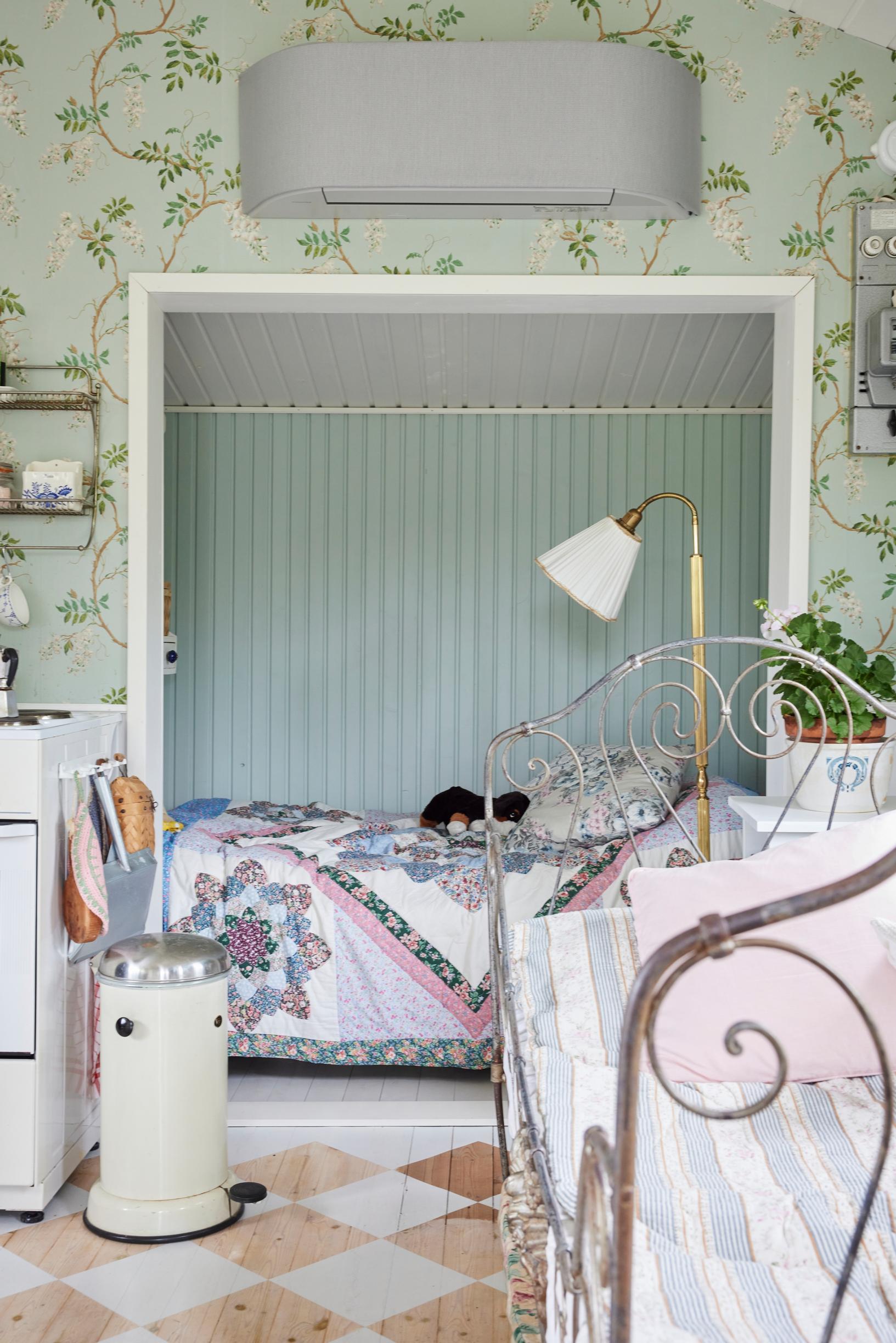 alcove with a box spring mattress