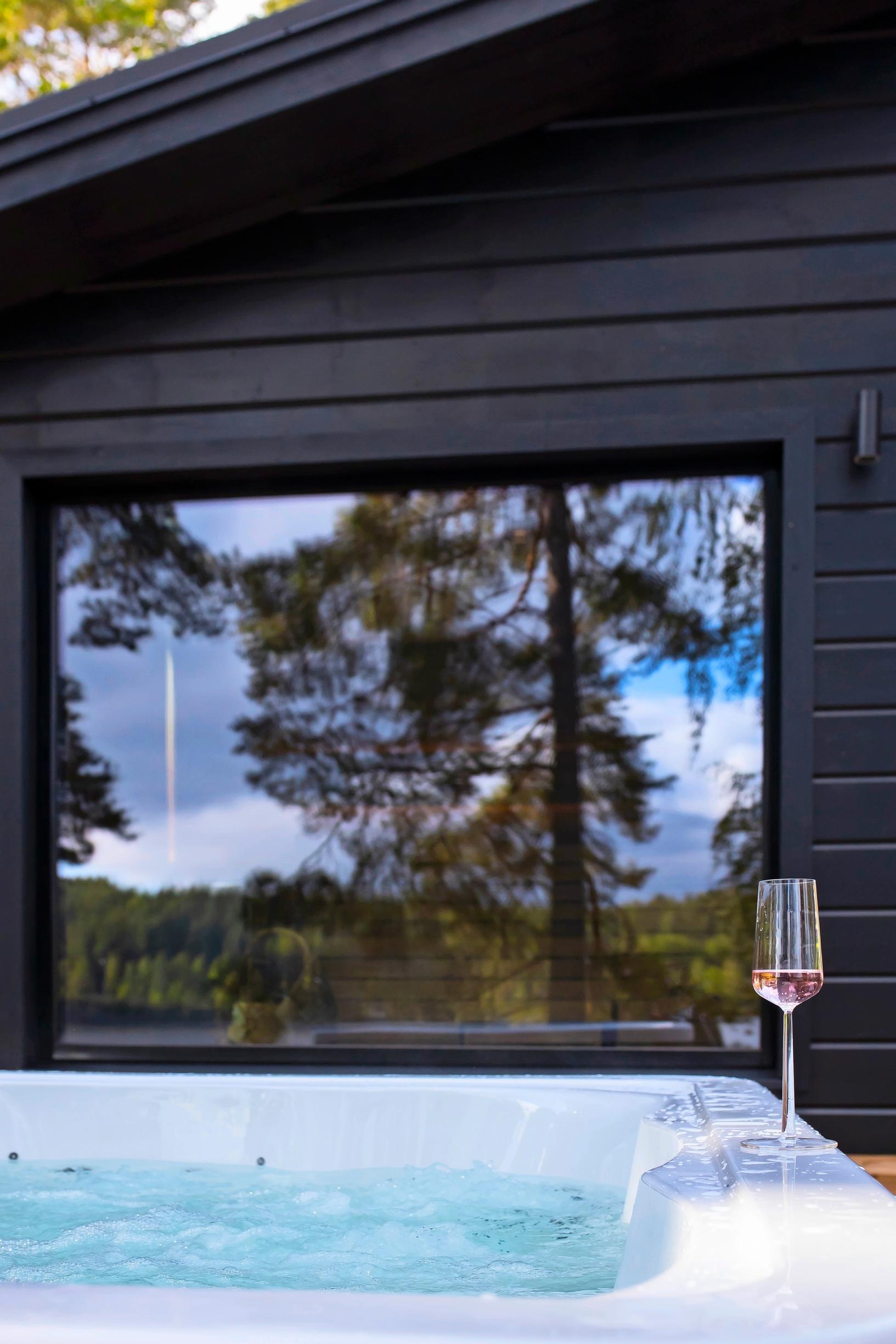 A hot tub and a champagne glass