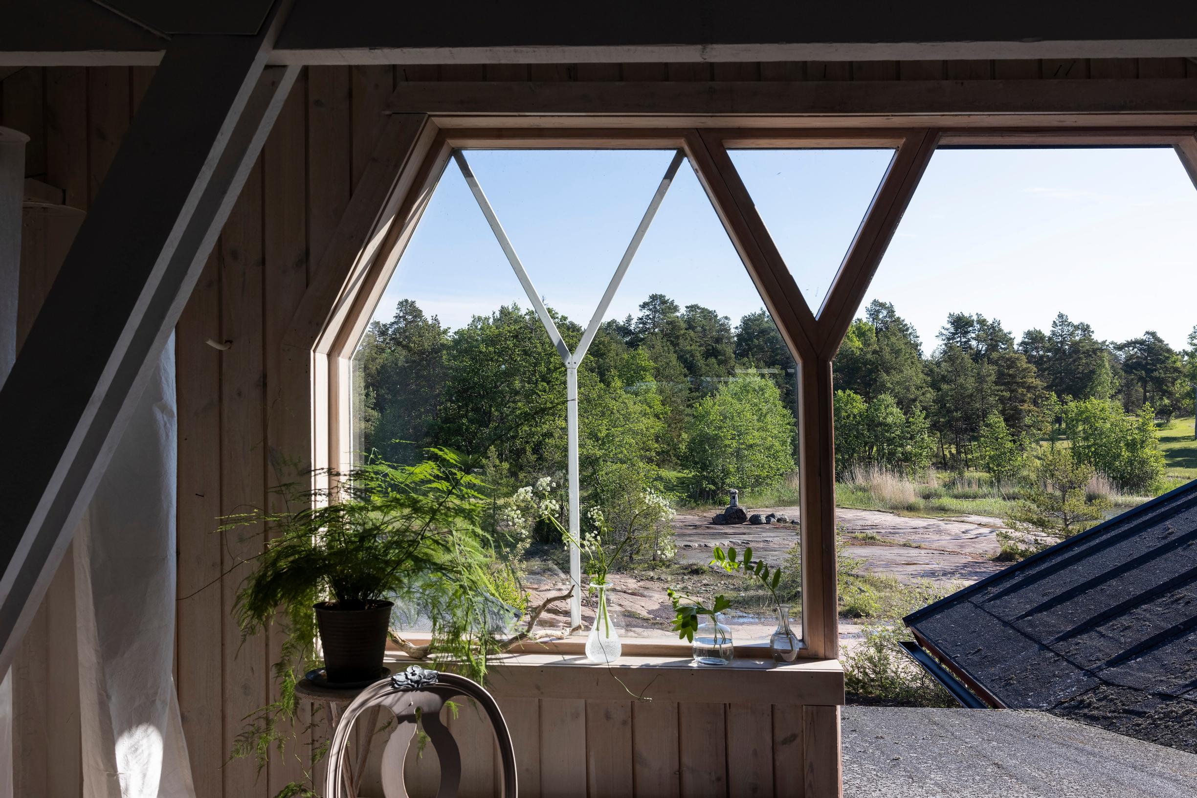 A view out of the boathouse’s decorative window.