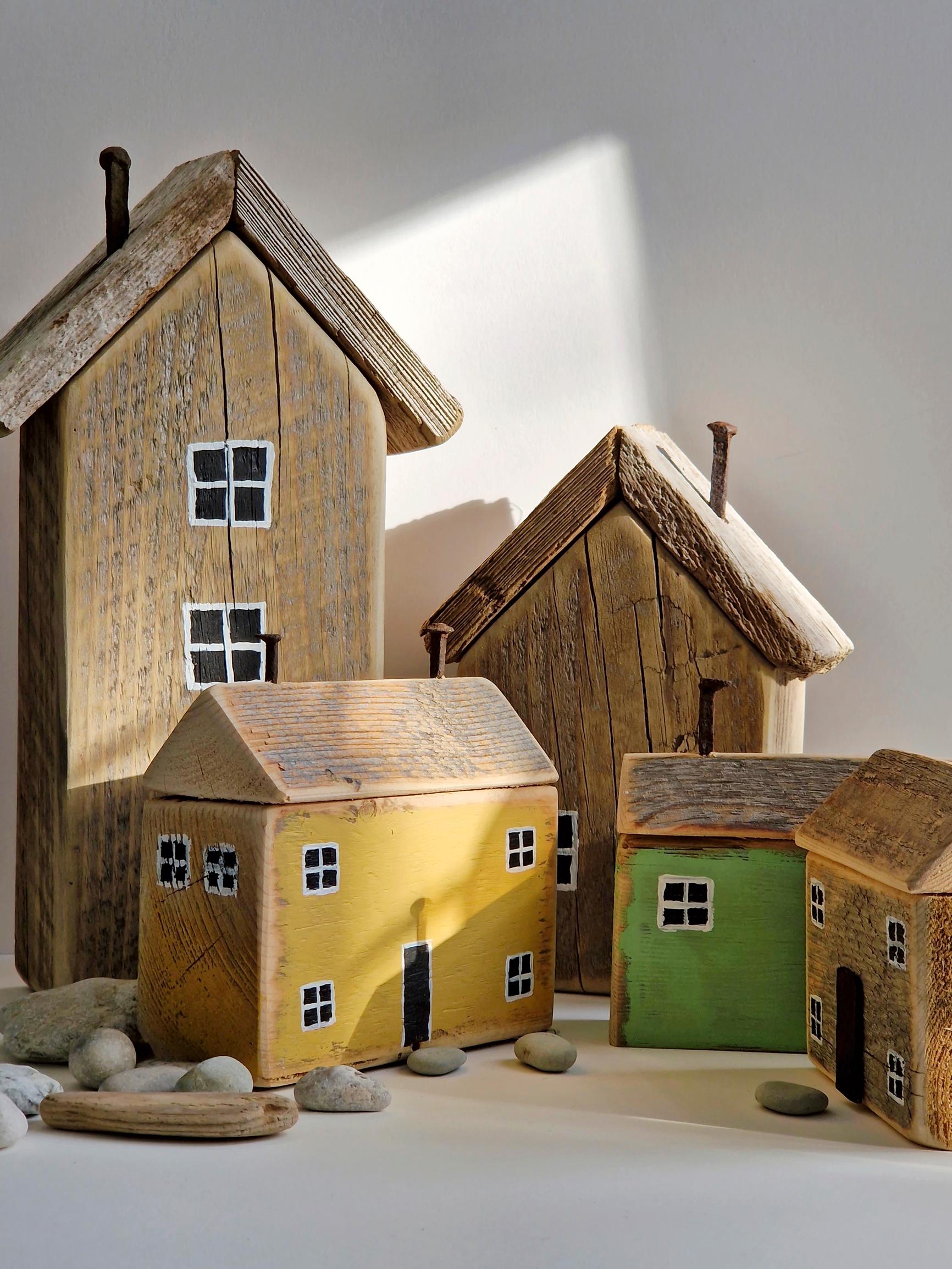 Turn scrap wood into charming bookends: build and paint a miniature house