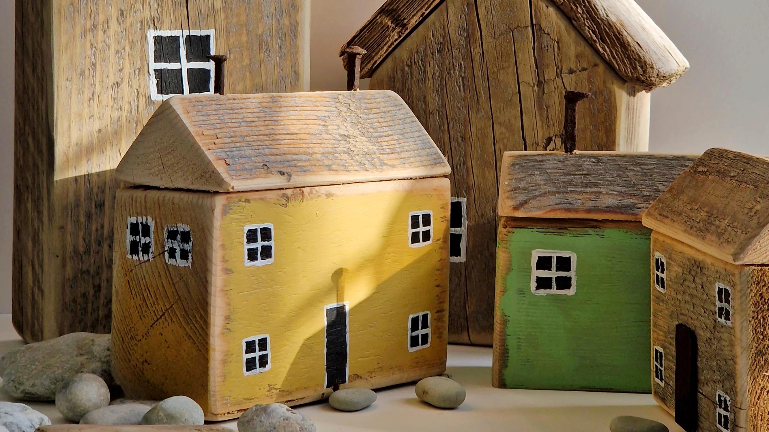 Turn scrap wood into charming bookends: build and paint a miniature house