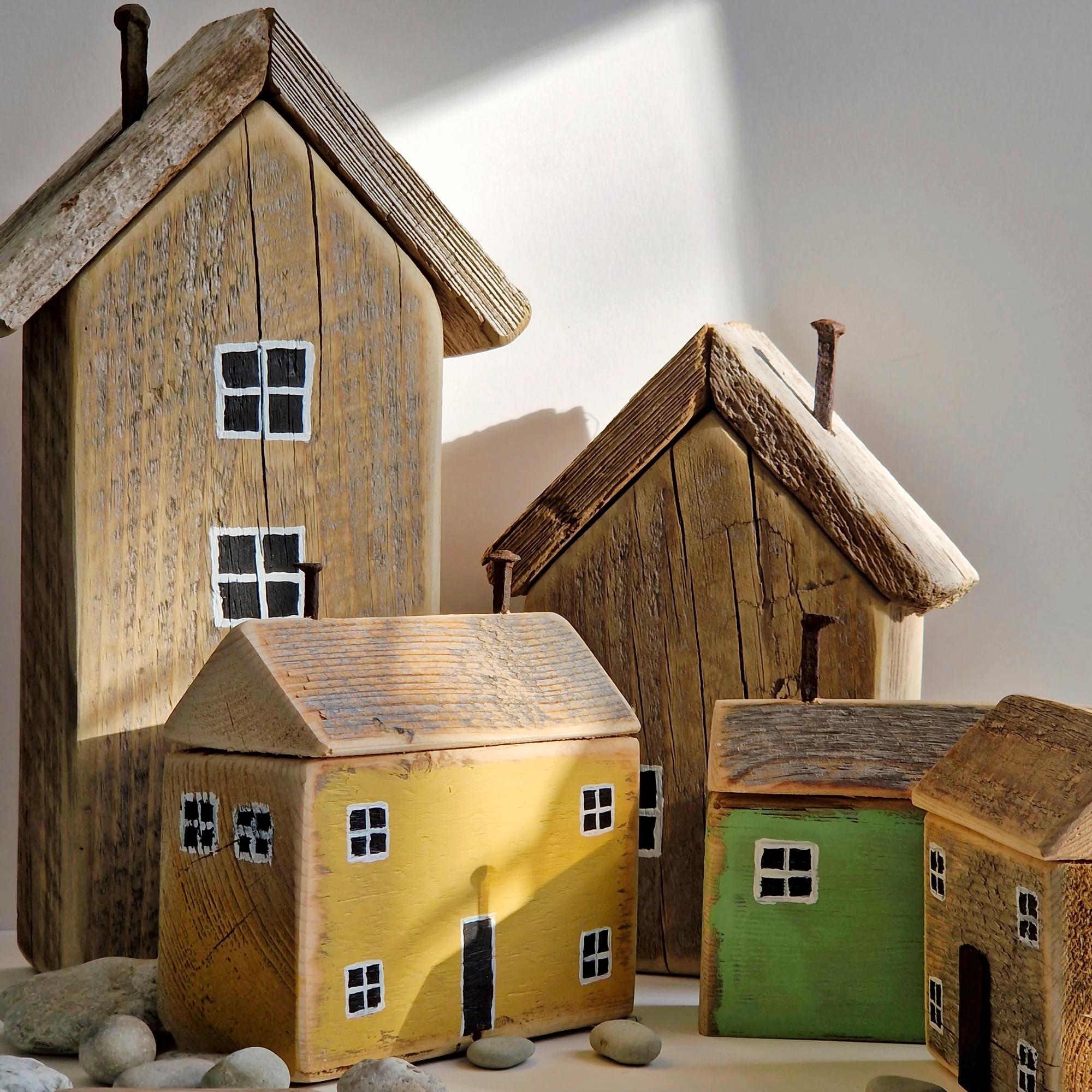 Turn scrap wood into charming bookends: build and paint a miniature house