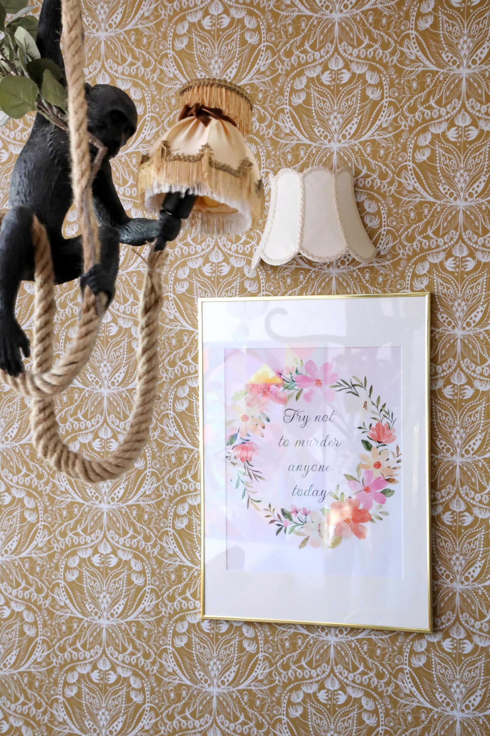 Painting on a wallpapered wall