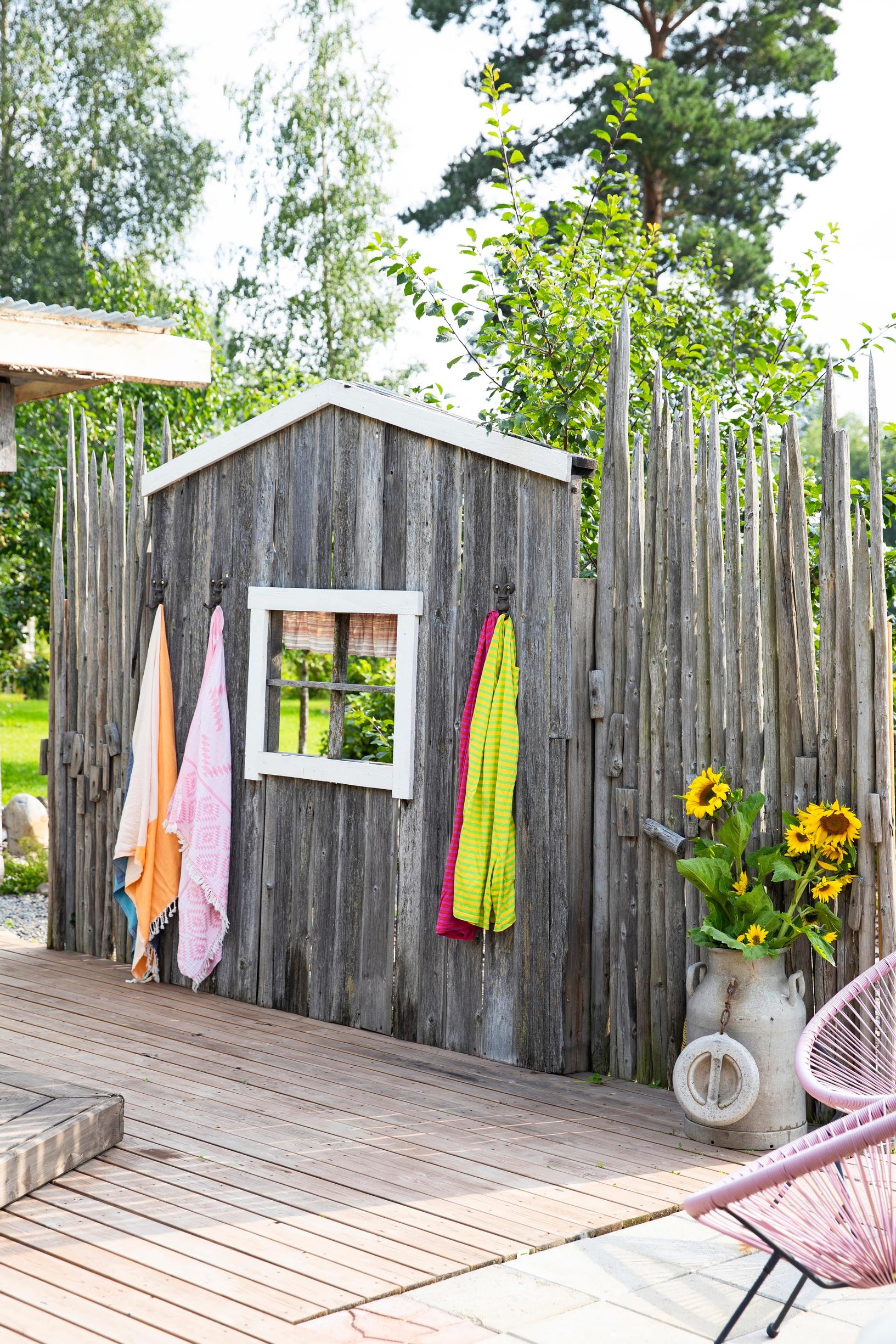 An old barn wall used as a privacy screen