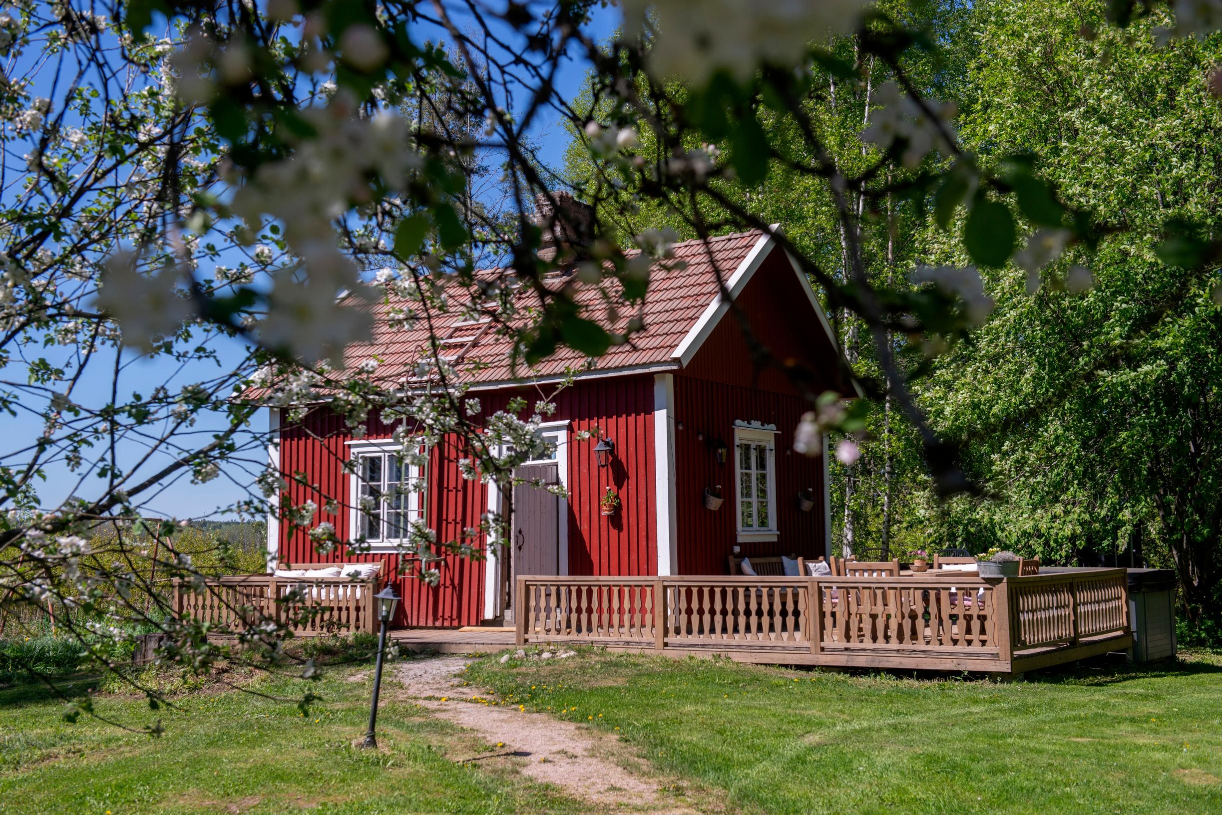 A red outdoor sauna