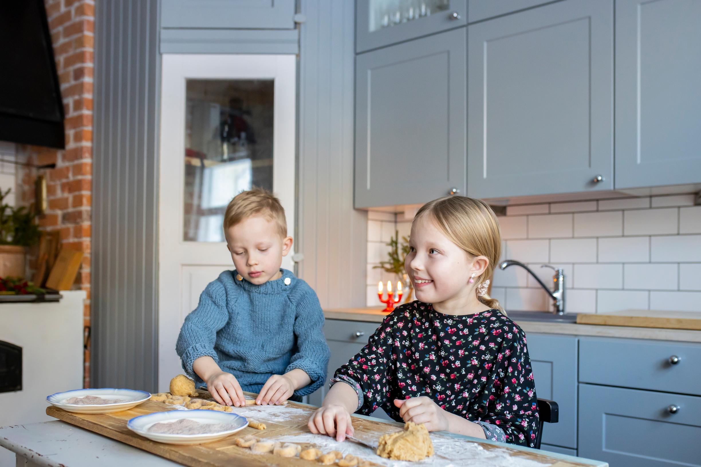 Children baking in the vicarage kitchen