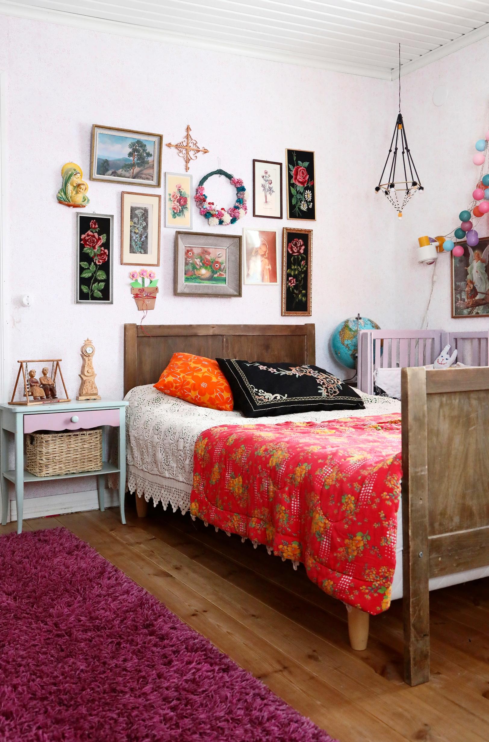 The parents’ bedroom gallery wall with fascinating heirlooms.