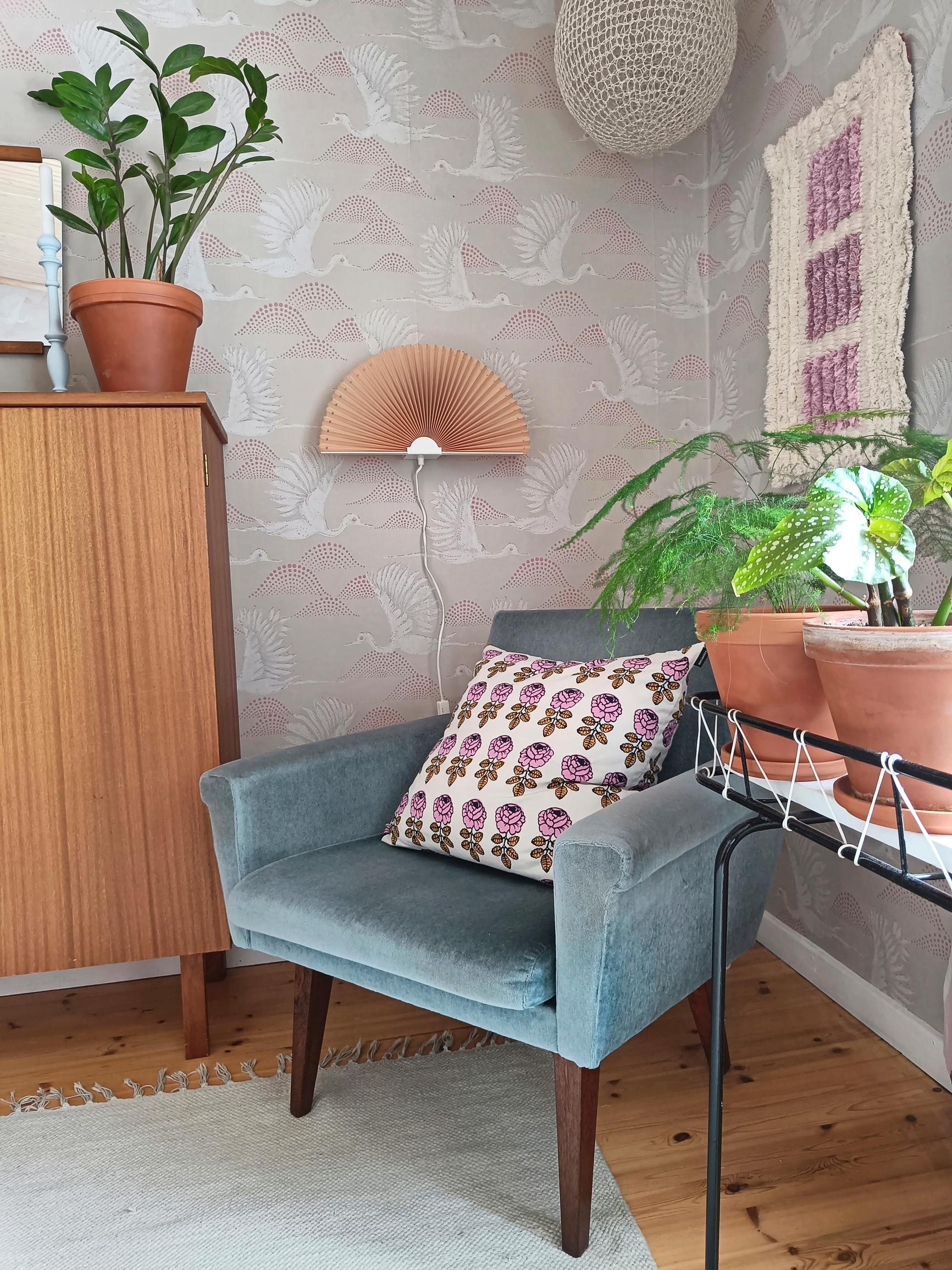 Fan-shaped lamp and old chair