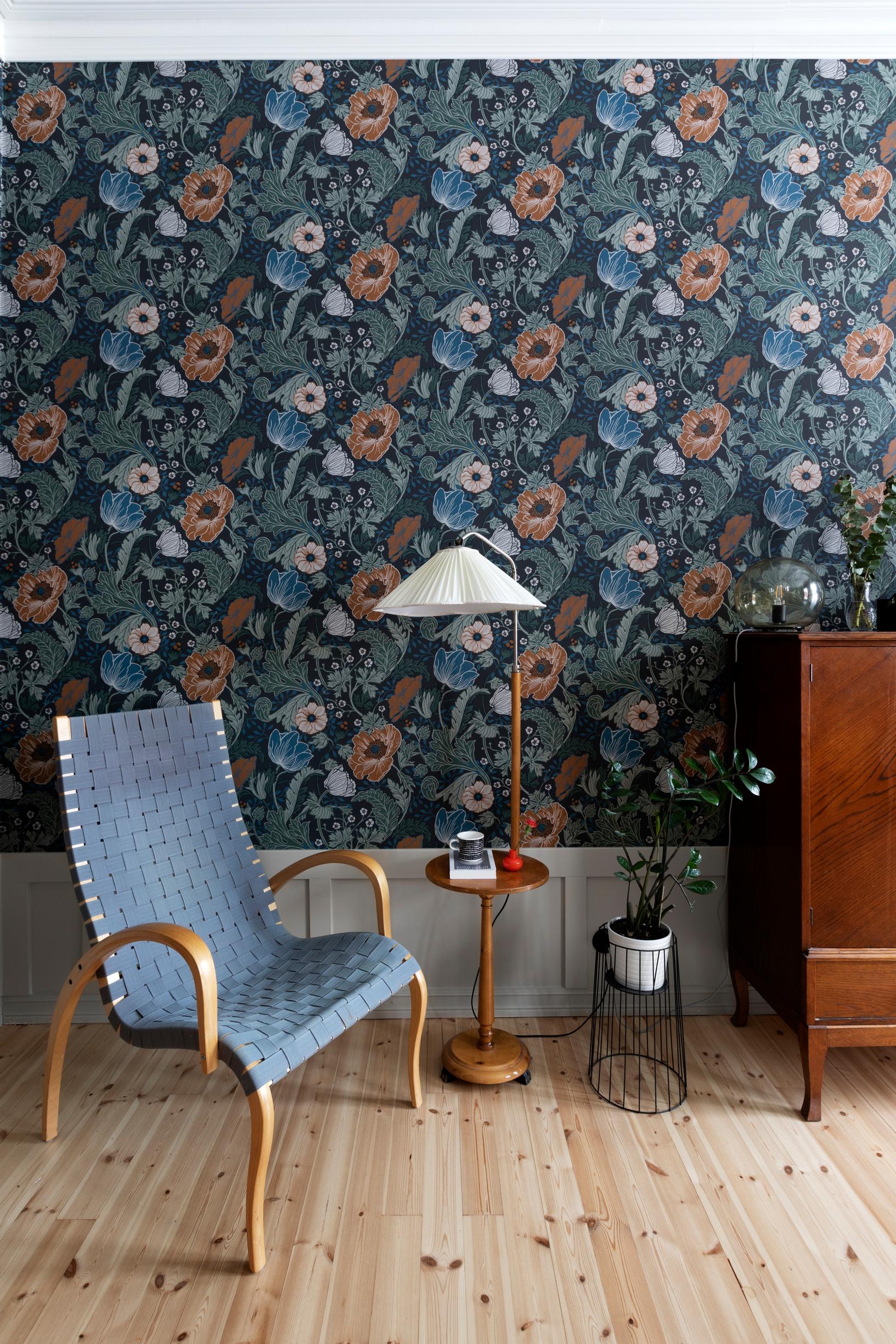 An Asko Harlekiini chair and a vintage floor lamp from a flea market