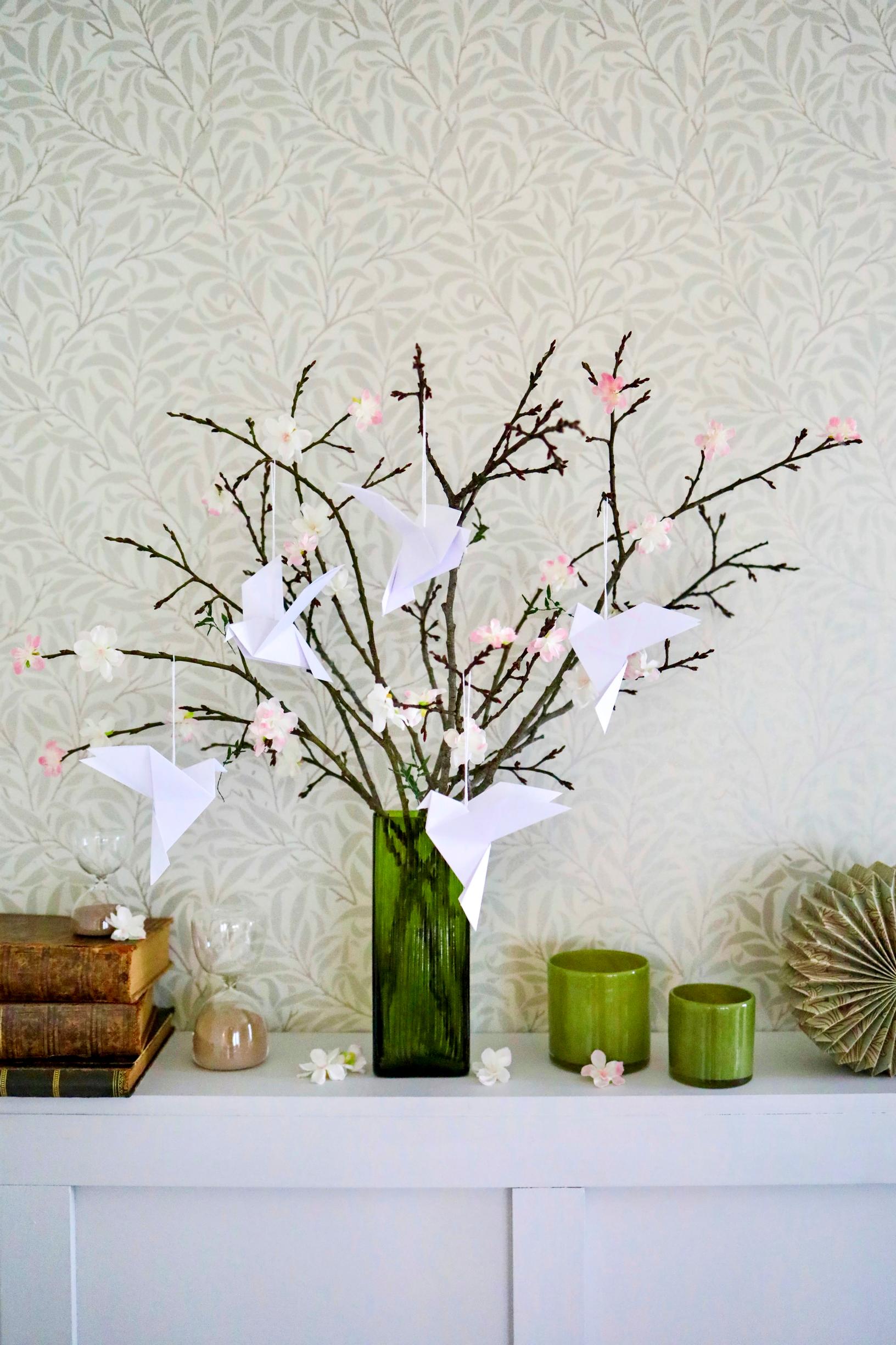 Origami doves on branches