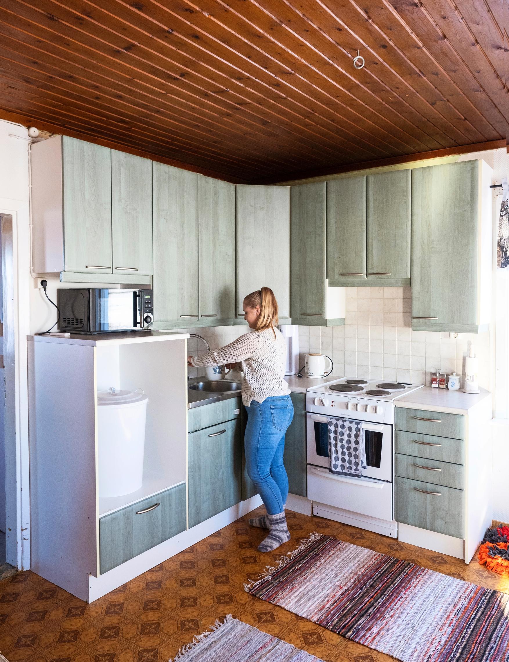 A woman working in the kitchen