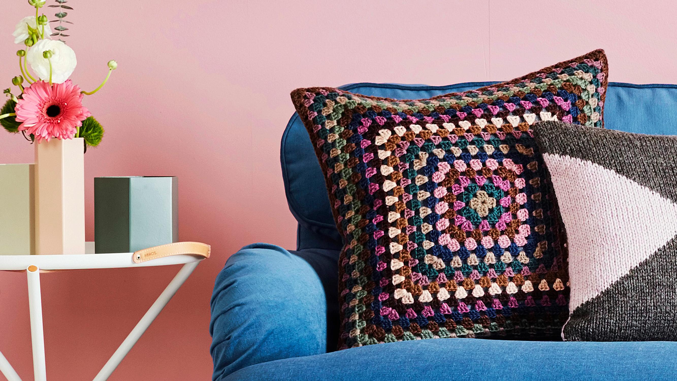 Granny square pillow—crochet a giant granny square from leftover yarn and sew it onto a ready-made pillow cover
