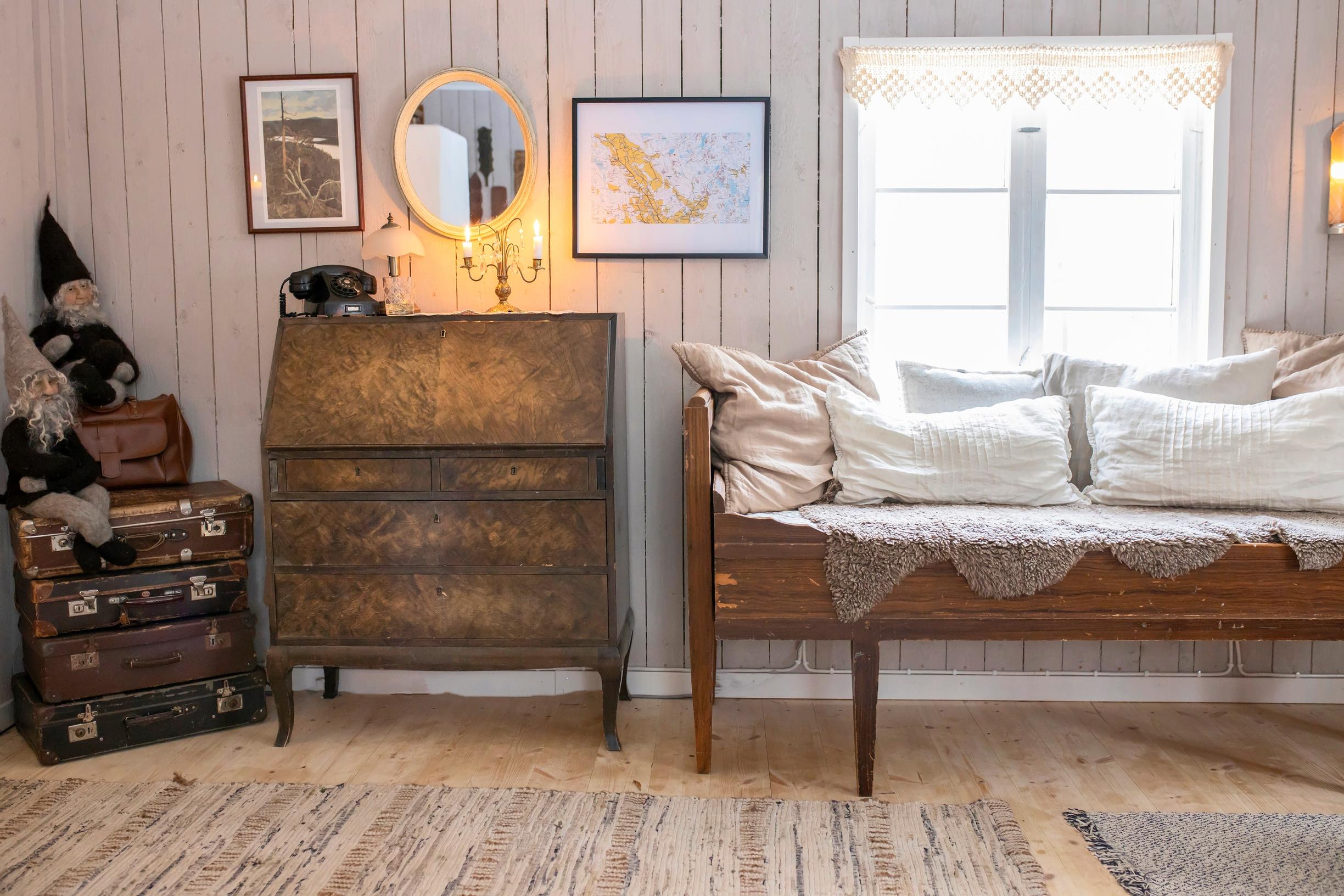 Wooden sofa and old suitcases