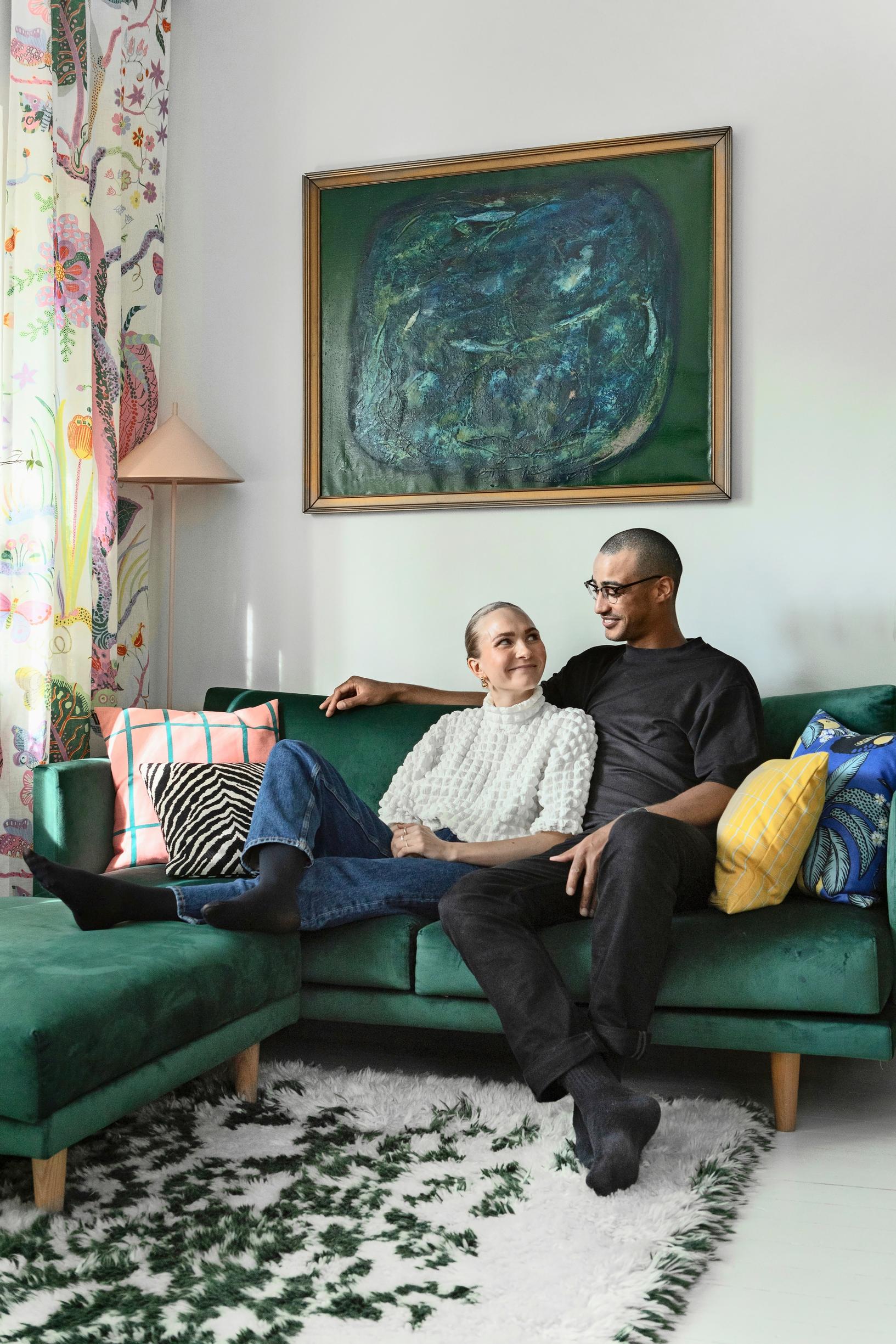 Anna and Kevin sitting on a Hakola sofa